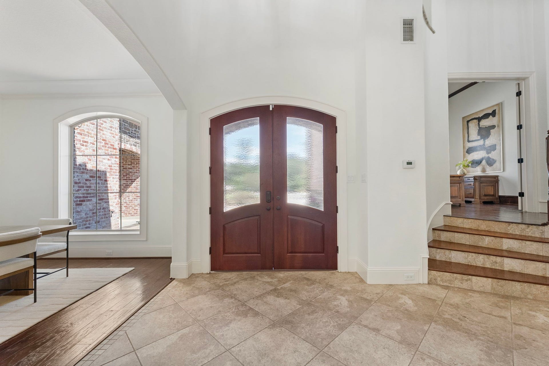 27507 Hunter Creek Court, Spring, TX 77386 Double-door entry opens to a spacious foyer with high ceilings and adjacent formal spaces.