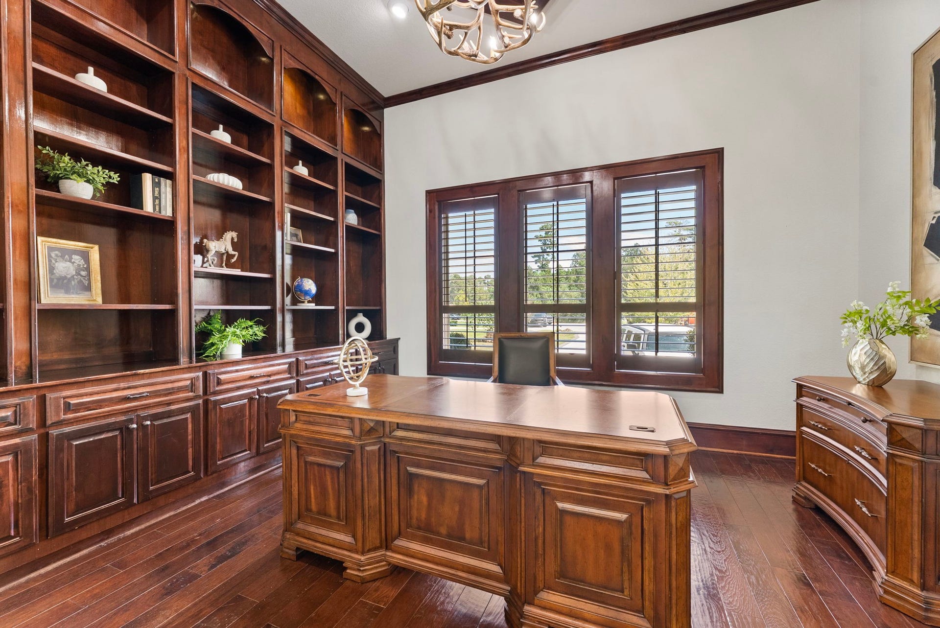 27507 Hunter Creek Court, Spring, TX 77386 Detailed view of the study's floor-to-ceiling built-in cabinetry, shelving and large windows.