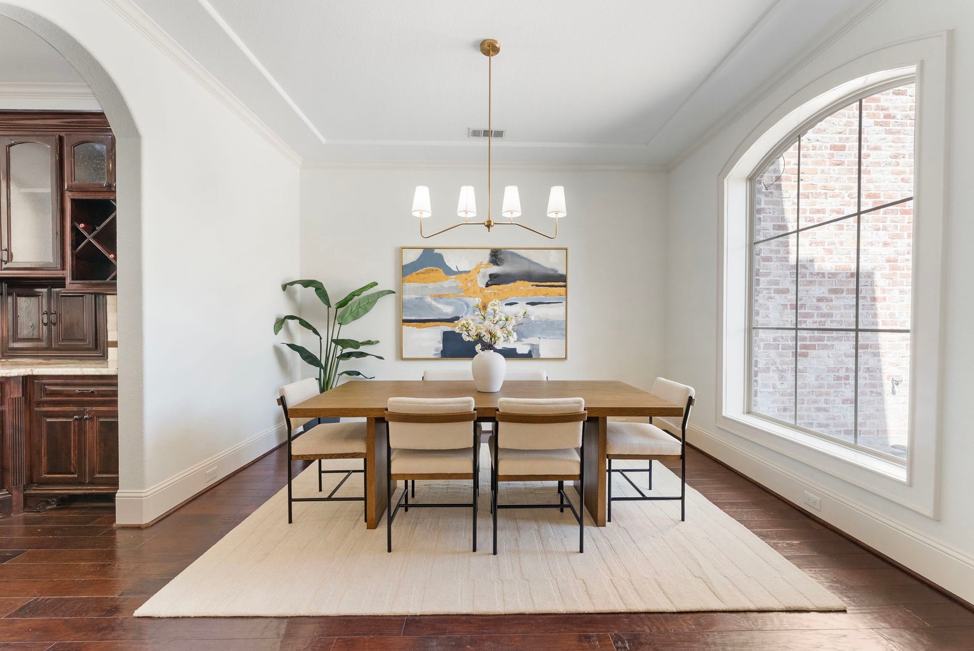 27507 Hunter Creek Court, Spring, TX 77386 Formal dining room with tray ceiling, hardwood flooring and oversized arched window.