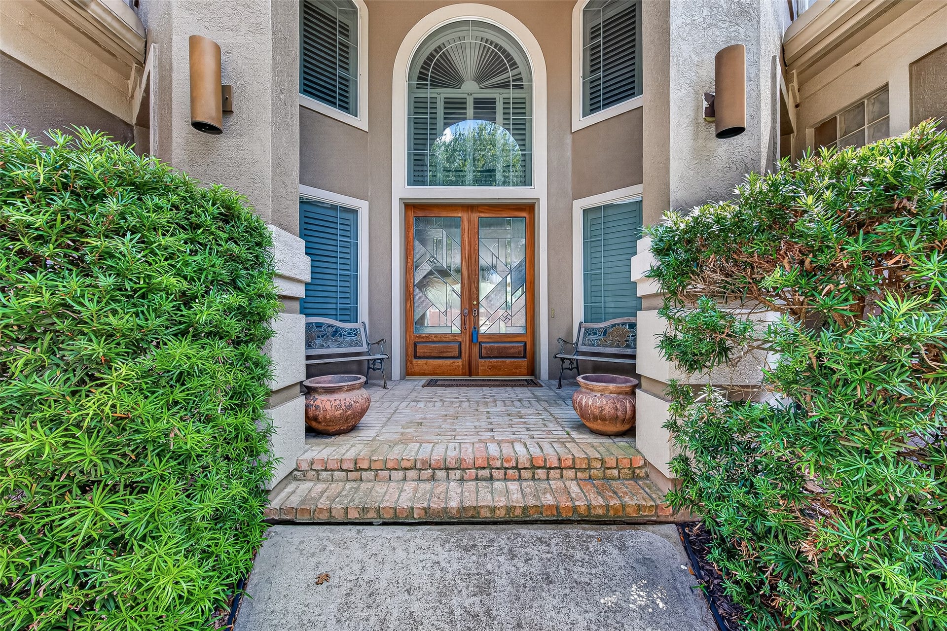 63 Harbor View Drive, Sugar Land, TX 77479 Elegant entryway featuring double French doors and a welcoming front porch.