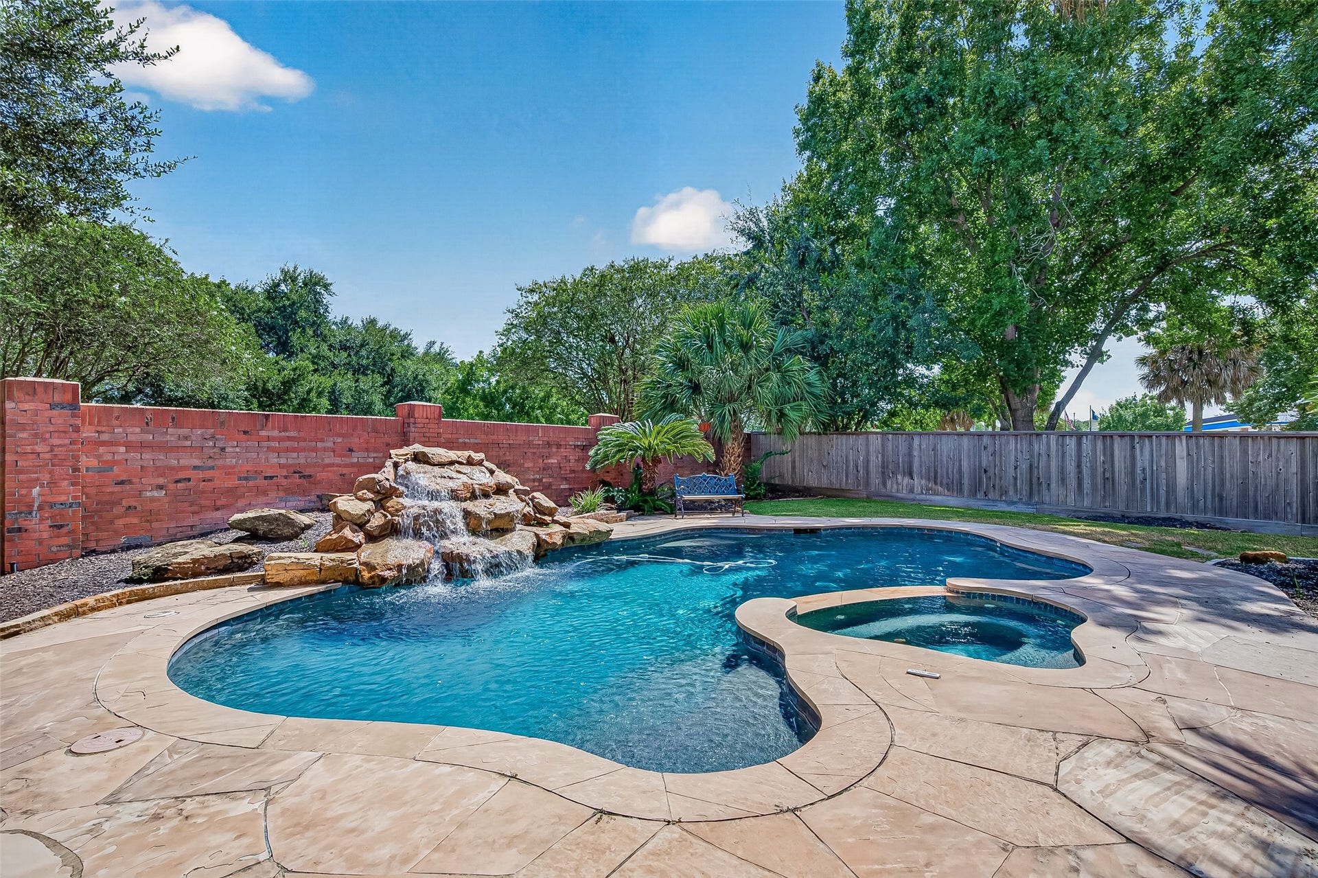63 Harbor View Drive, Sugar Land, TX 77479 Another look at your stunning pool and spa with a cascading waterfall feature
