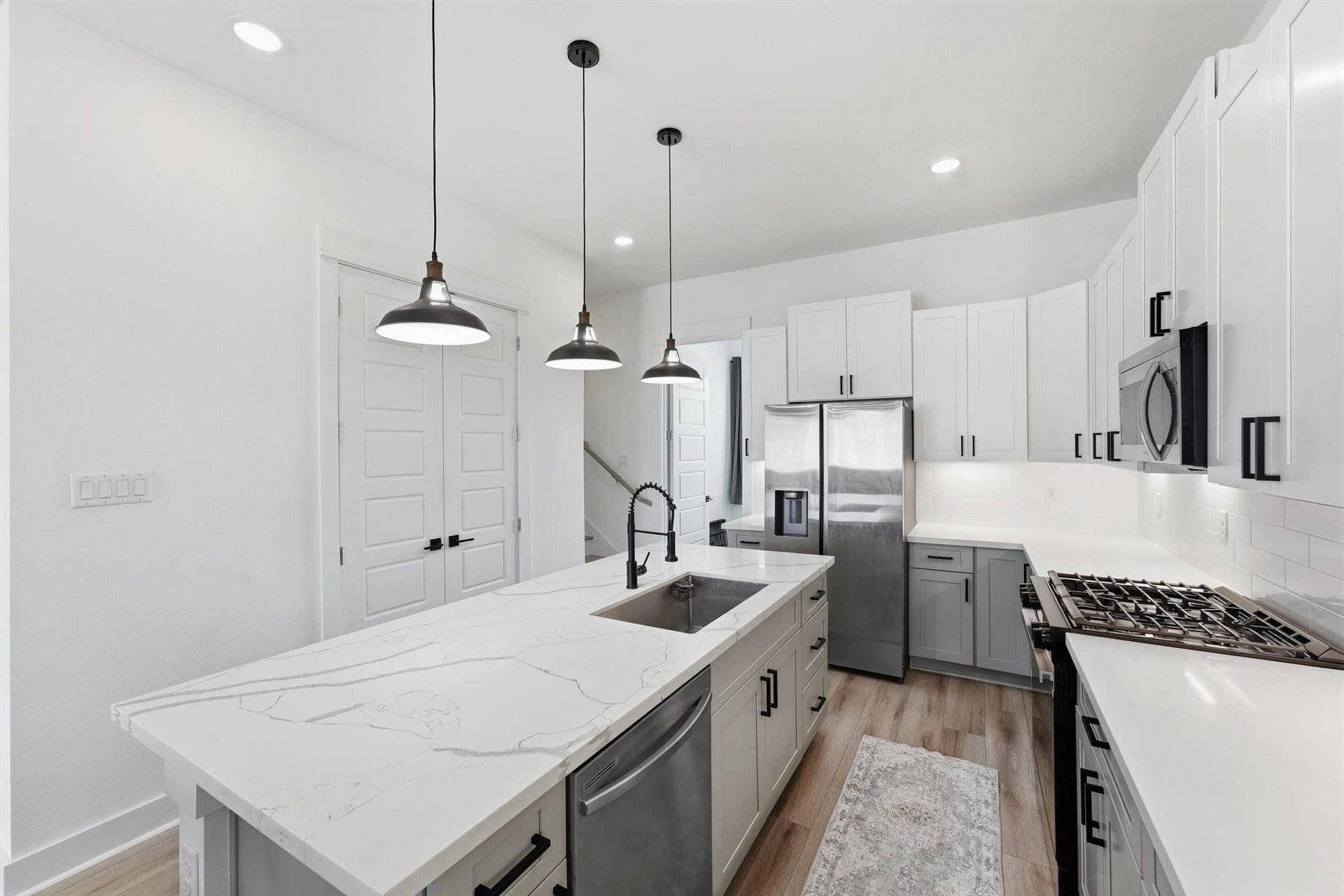 Large kitchen island with plenty of prep space and room for seating.