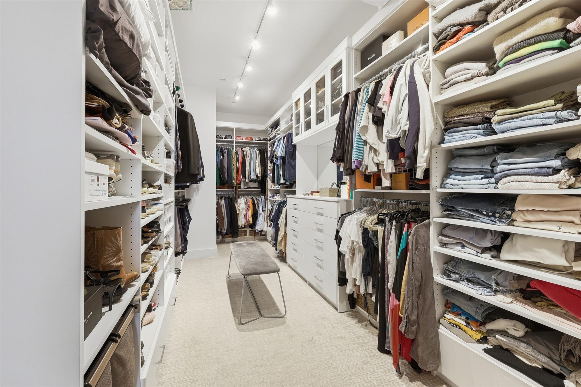 2710 Steel Street, #405, Houston, TX 77098 Custom built primary closet system.