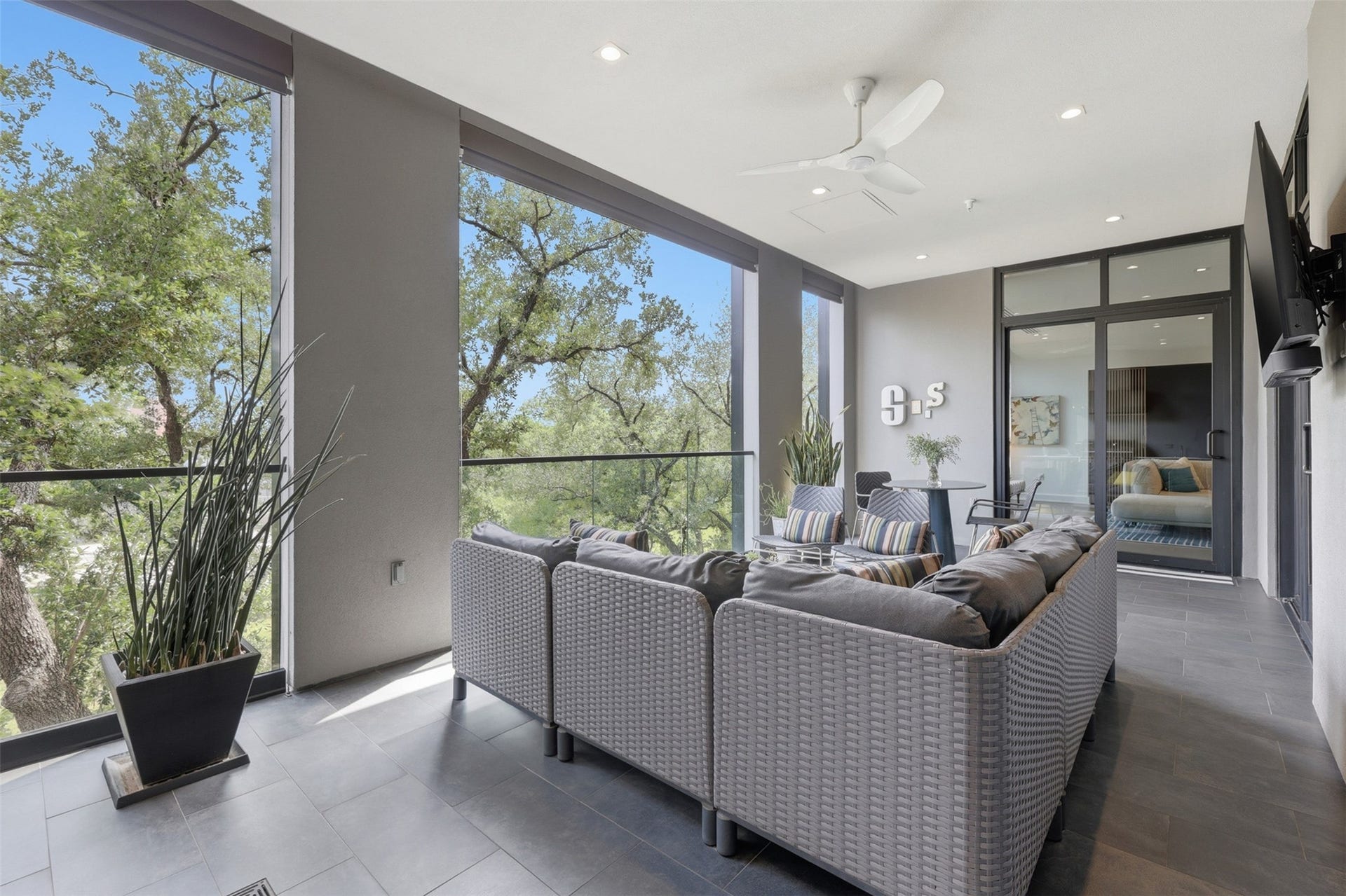 2710 Steel Street, #405, Houston, TX 77098 Automatic shades on the terrace provide additional protection from the elements.
