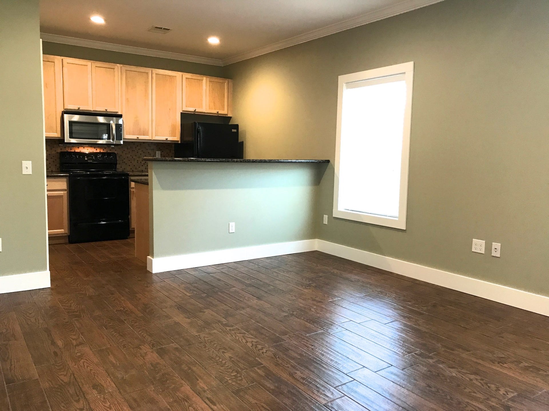 View of the living room into the kitchen.