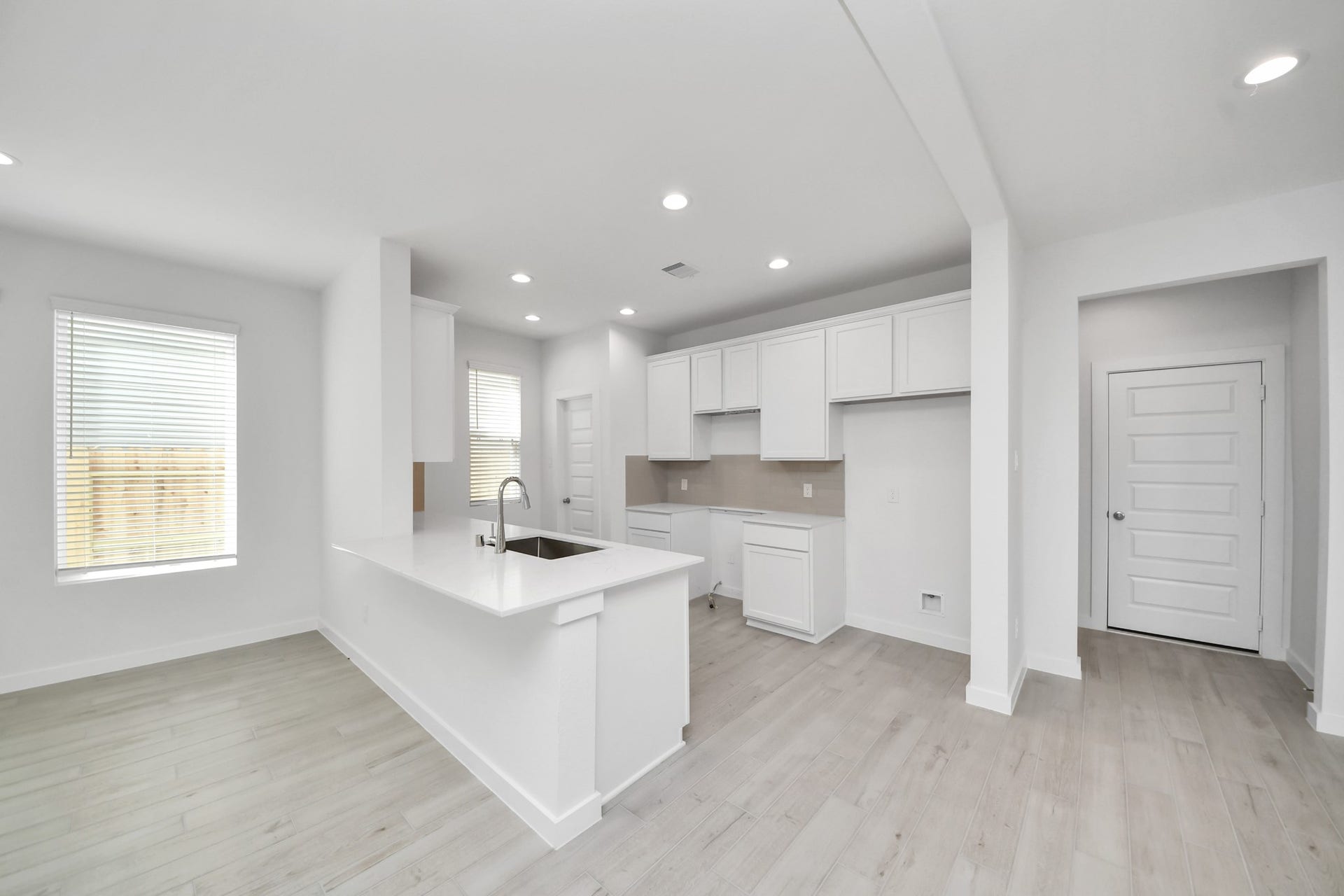 5814 Madison Trail Drive, Richmond, TX 77469 This generously spacious kitchen is a dream realized! Sample photo of completed home with similar floor plan. Actual colors and selections may vary.