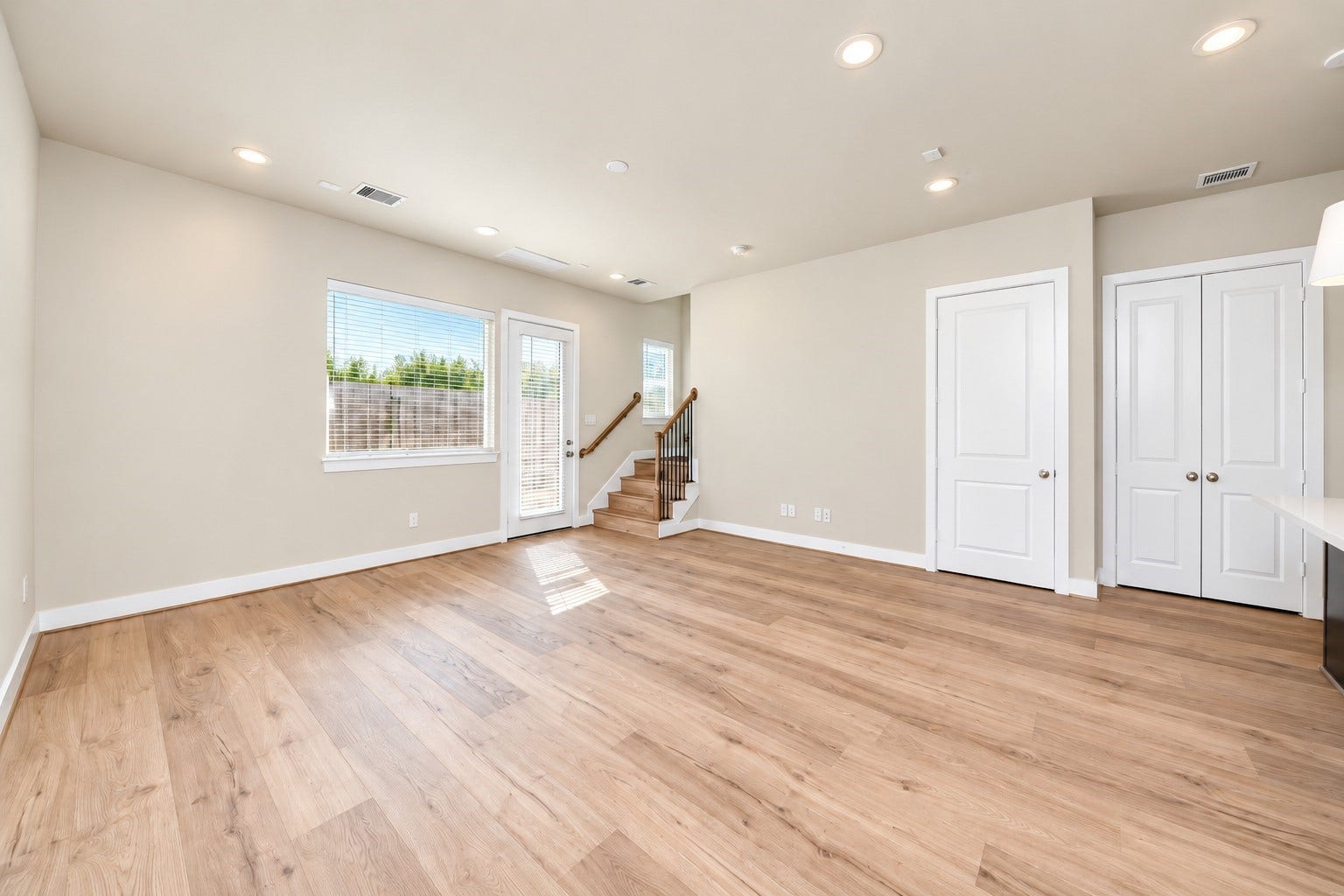5908 Jasper Jones Way, Houston, TX 77091 First floor living with large storage closet under the stairs.