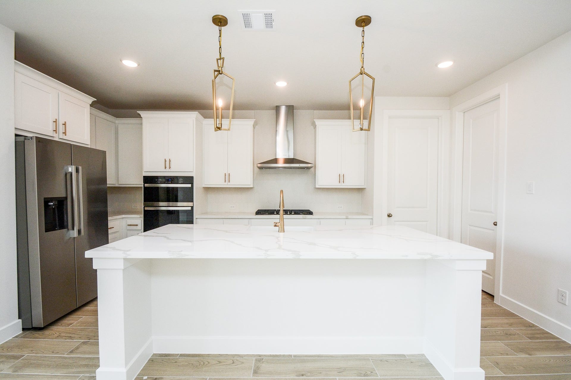 Expansive kitchen overlooking the living area