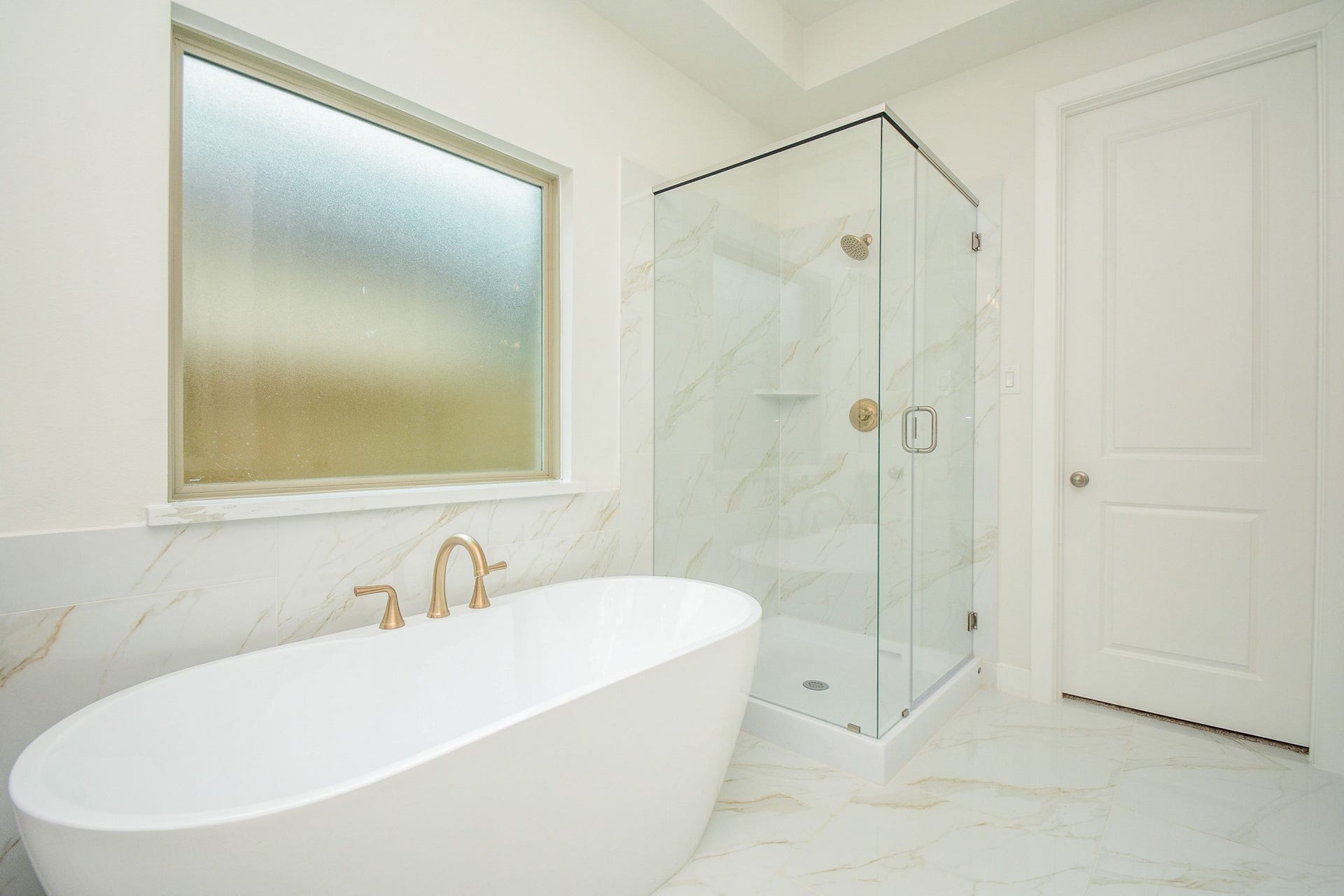 Relaxing soaking tub and separate glass shower