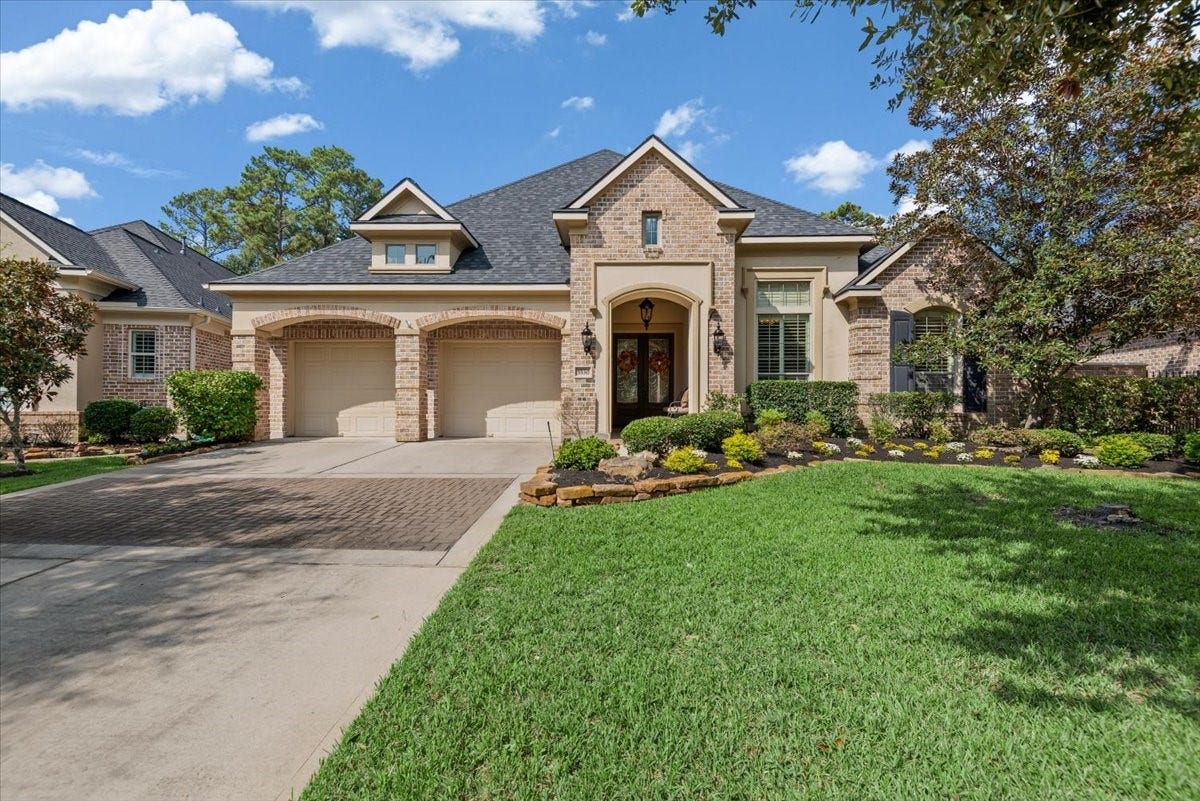 5530 Regal Landing Drive, Kingwood, TX 77345 Brick and stucco exteriors give the entire neighborhood a cohesive, sophisticated design.