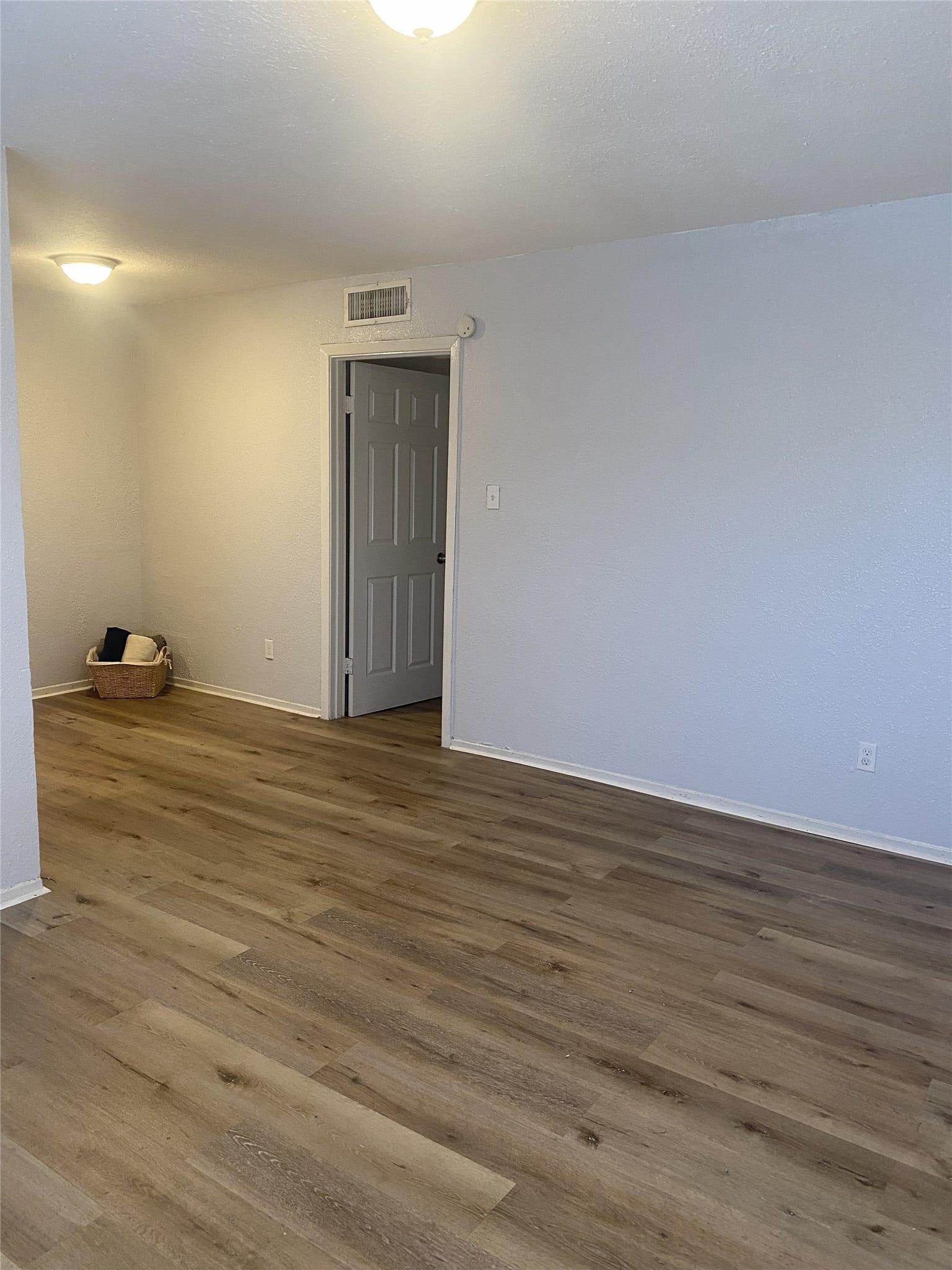 9100 Dodson St, #21, Houston, TX 77093 Spacious living room and dining room. New flooring
