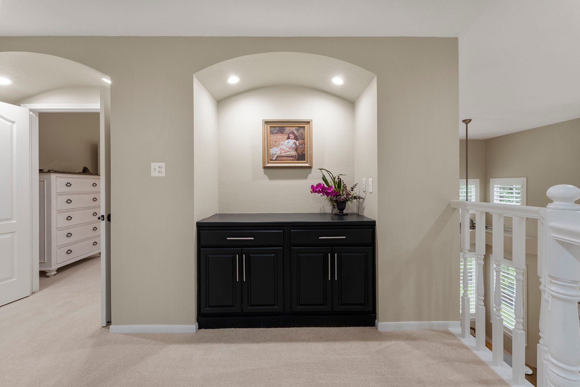 The first and second floor have a niche that provides space to highlight artwork or decor with extra storage.