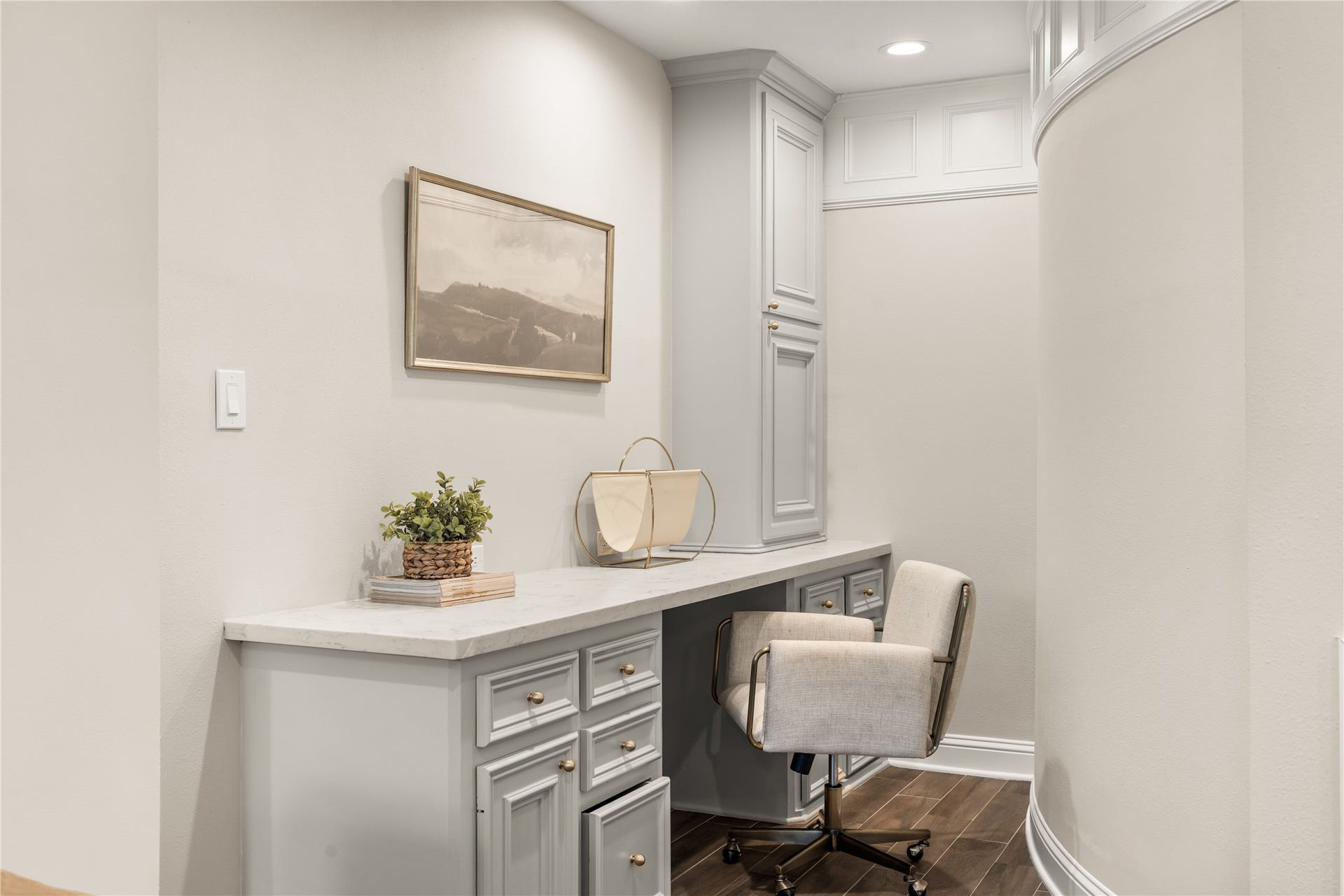 4719 Breezy Point Drive, Houston, TX 77345 A thoughtfully designed built-in workspace provides a polished, dedicated setting for working from home, studying, or household organization.
