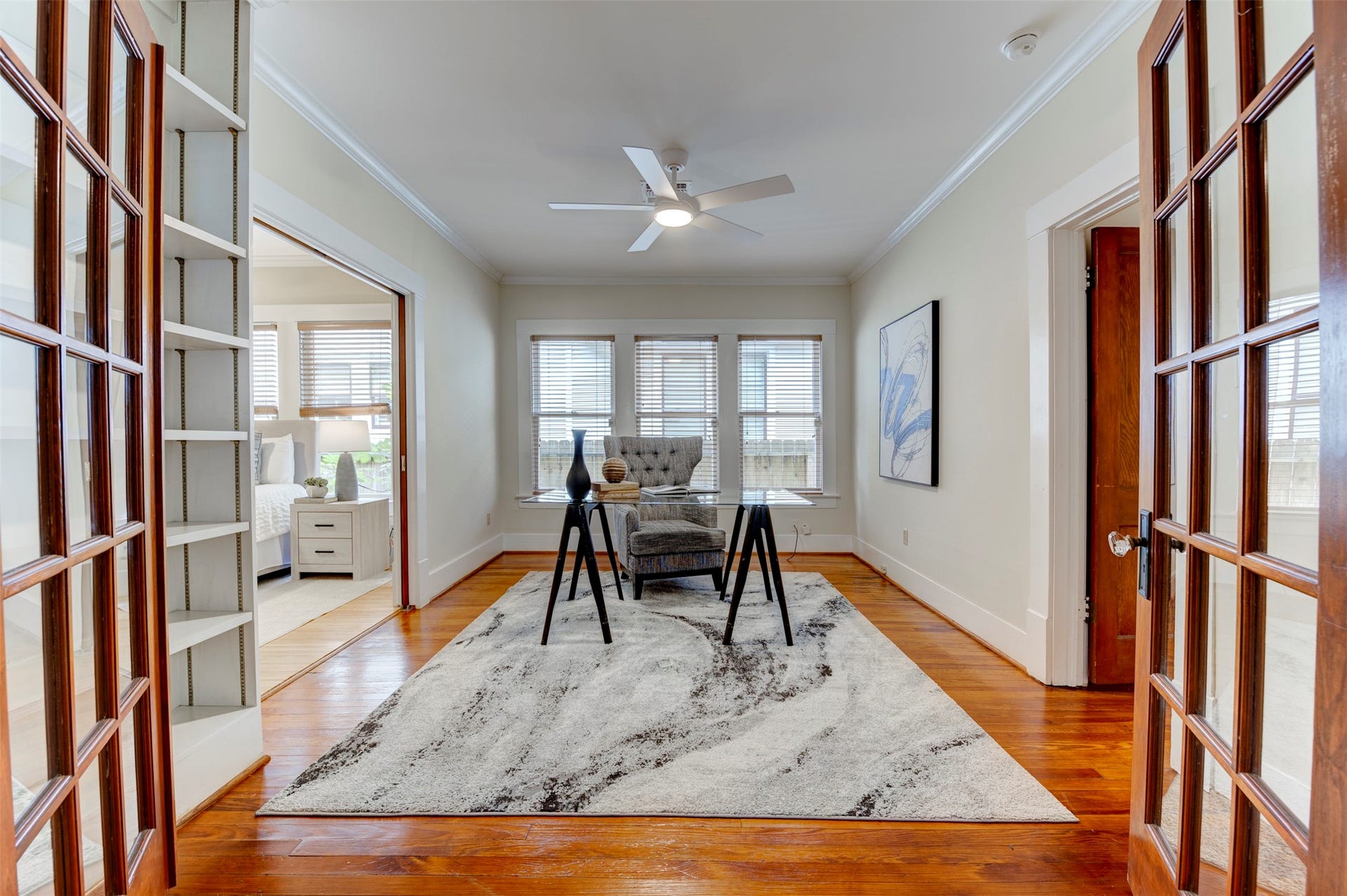 Between the two bedrooms is space that is perfect for an office, study, nursery or a guest room.  A bonus to this space is a wall of built-in book storage.