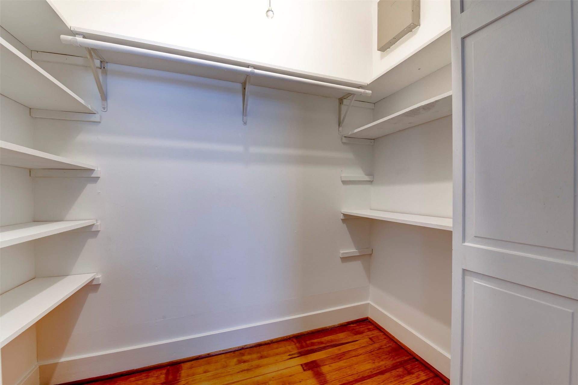 walk-in closet off the secondary bedroom.