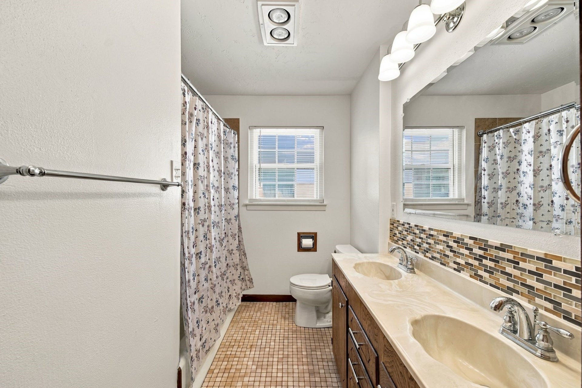 5125 Nina Lee Lane, Houston, TX 77092 Enjoy a spacious walk-in closet featuring built-in shelves, ample hanging space, and elegant drawers for perfect organization.