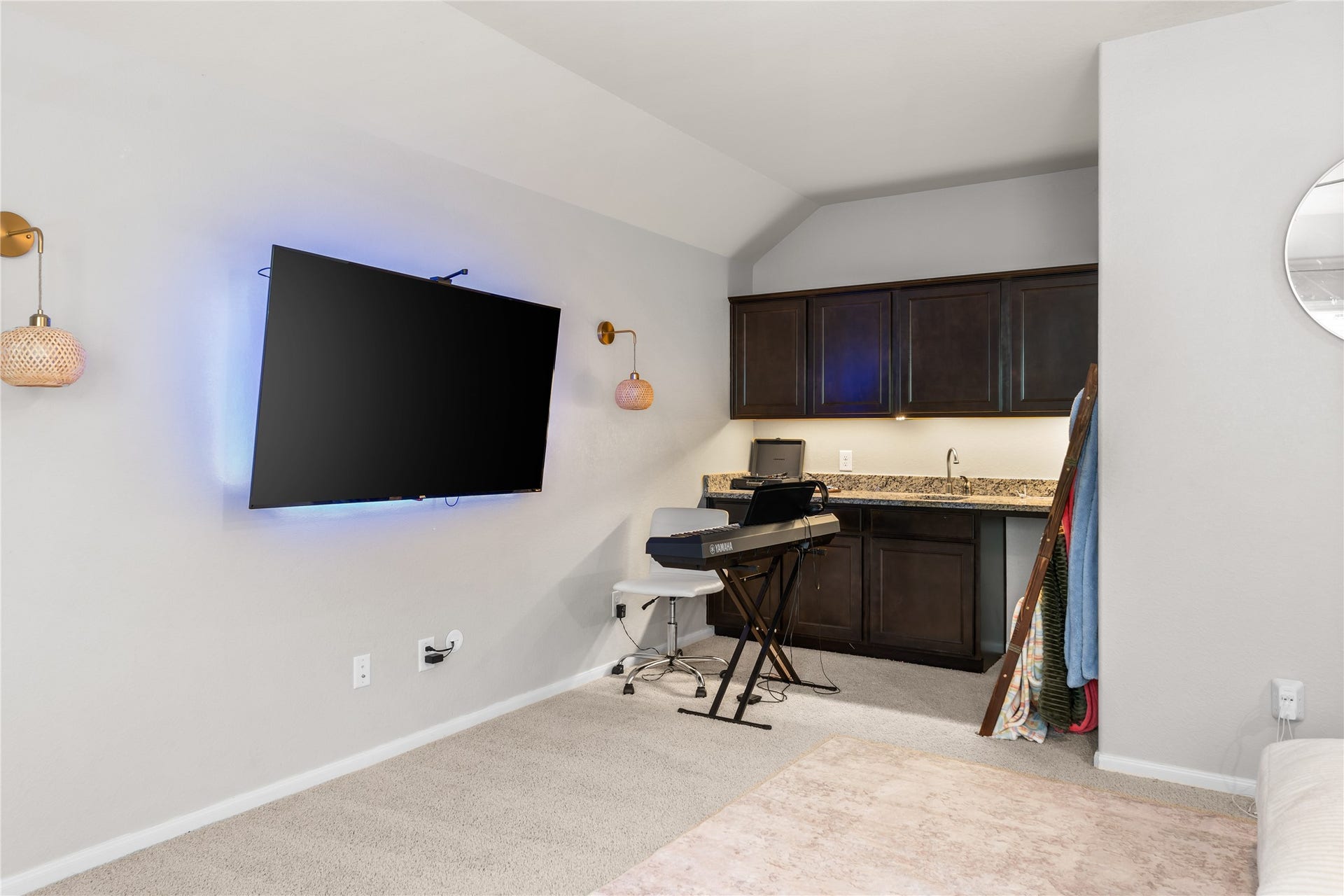 Wet bar serving the upstairs entertainment space.