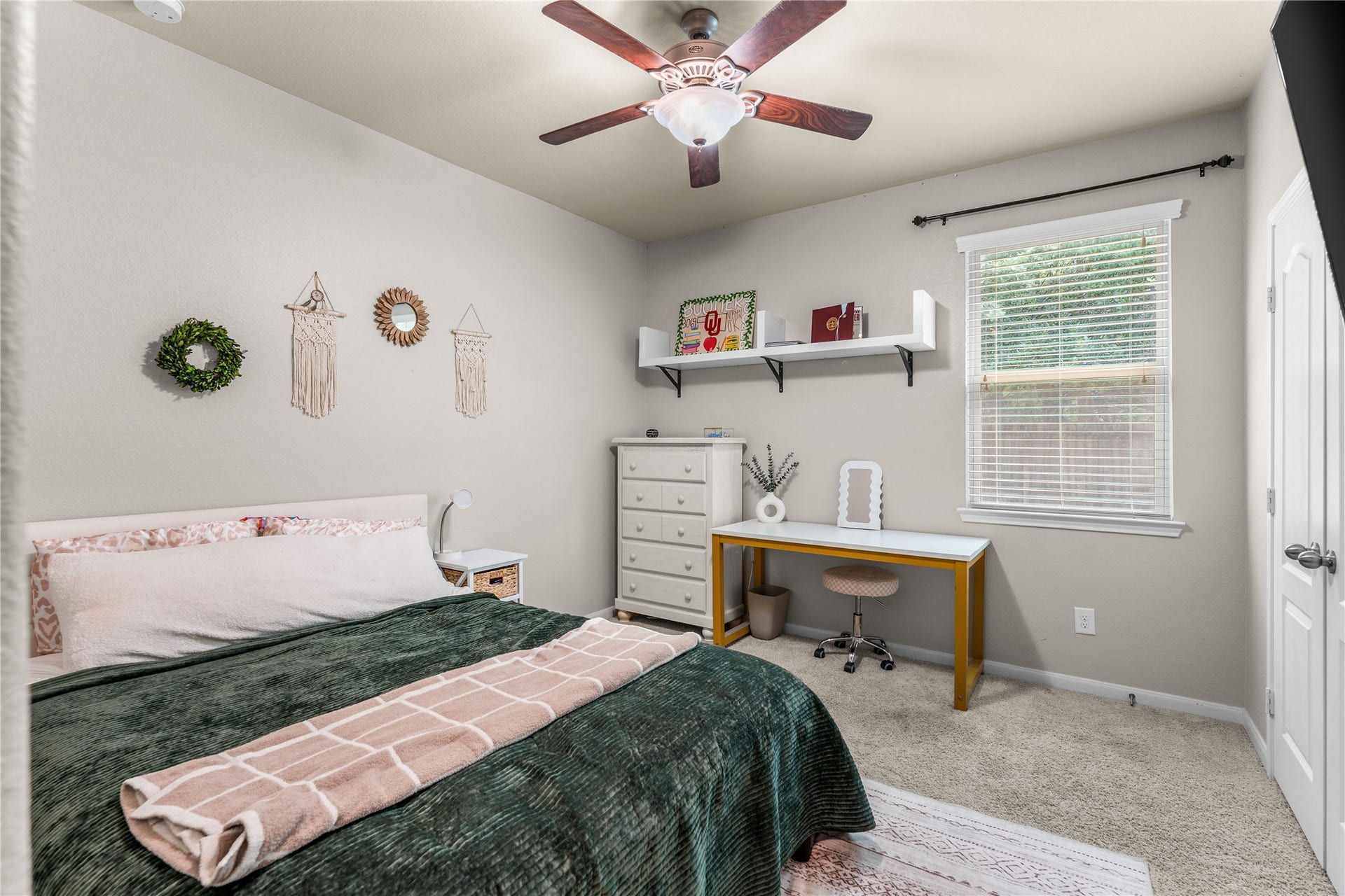 Comfortable secondary bedroom with versatile living options.