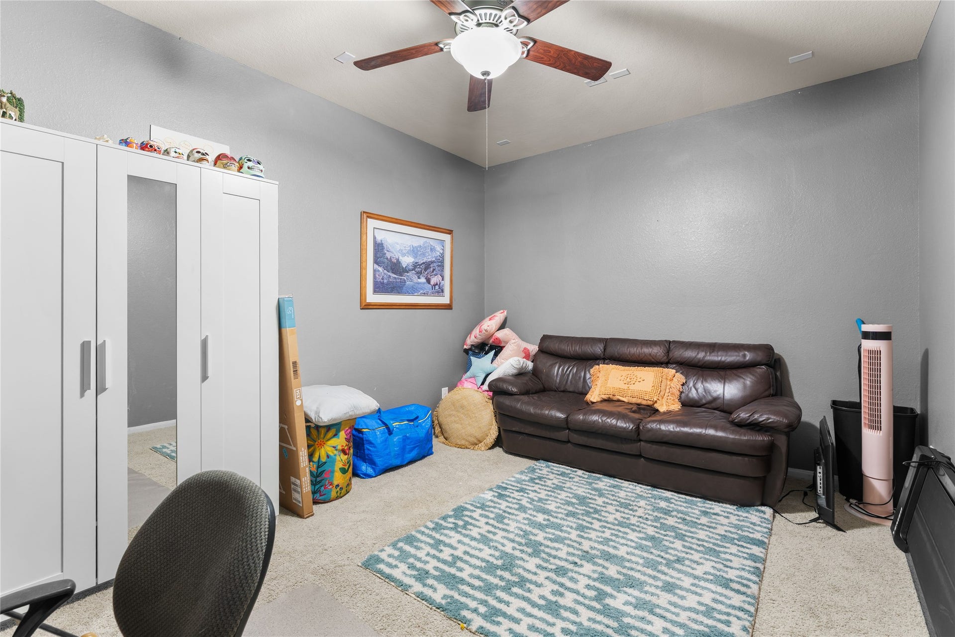 Alternate media room view with comfortable seating area.