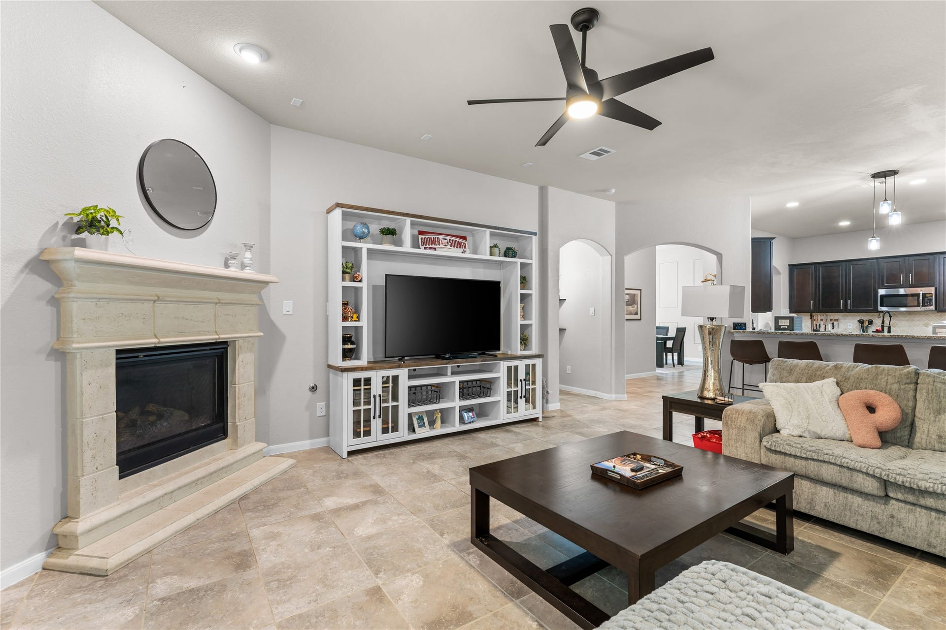 Living room highlighting the open layout and fireplace focal point.