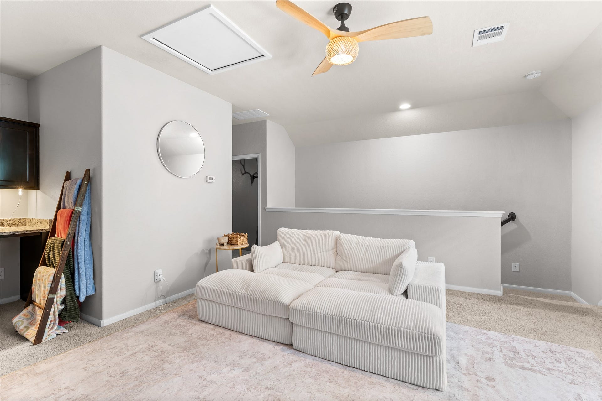 Additional angle of the upstairs retreat with abundant open space.