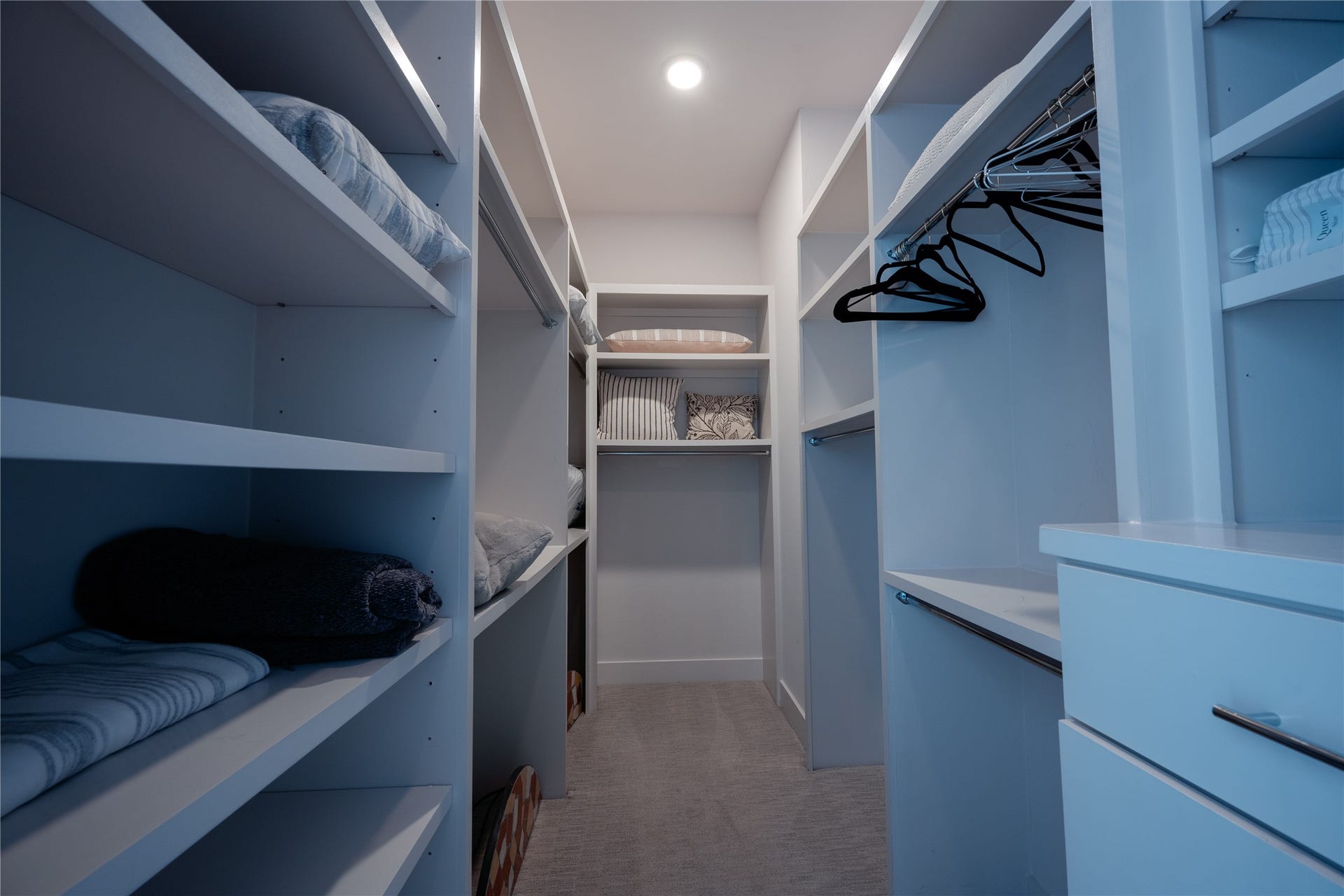 2826 Clay Street, Houston, TX 77003 Spacious walk-in closet featuring ample shelving and hanging space, perfect for organized storage.
