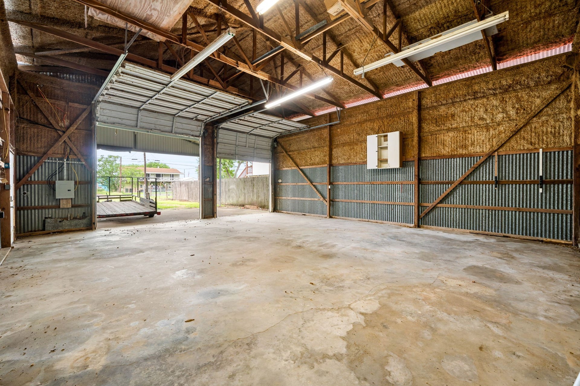221 11th Street, San Leon, TX 77539 This property features a 30x30 garage that is capable of storing a boat or RV with 14ft eaves and 12ft garage doors.