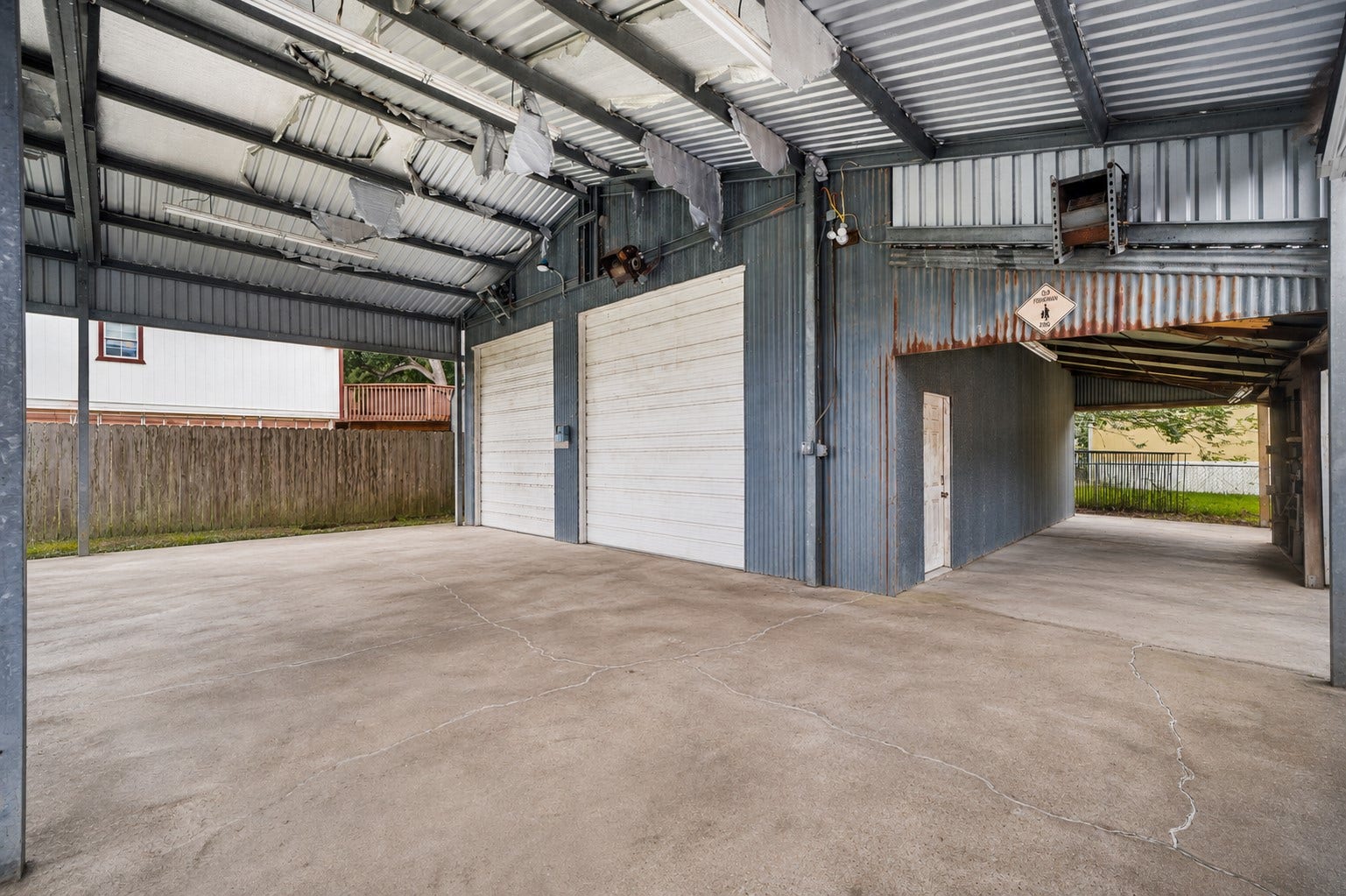 221 11th Street, San Leon, TX 77539 There's a 26x40 carport with metal roof and 10x30 lean-to with fish cleaning table and utility