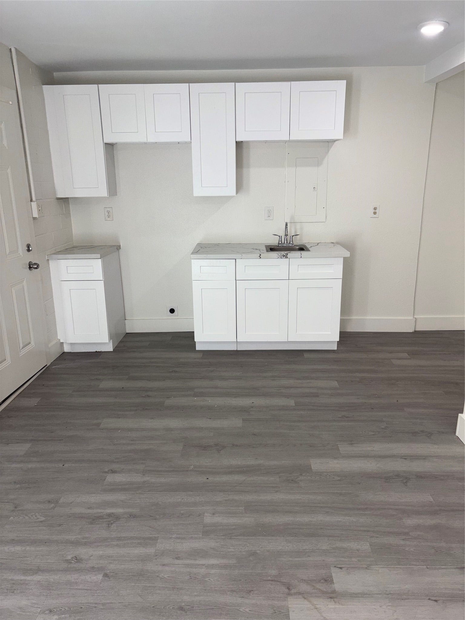 4006 Avenue R 1/2 Rear, #Down, Galveston, TX 77550 Kitchen area, Oven and refrigerator will be installed.