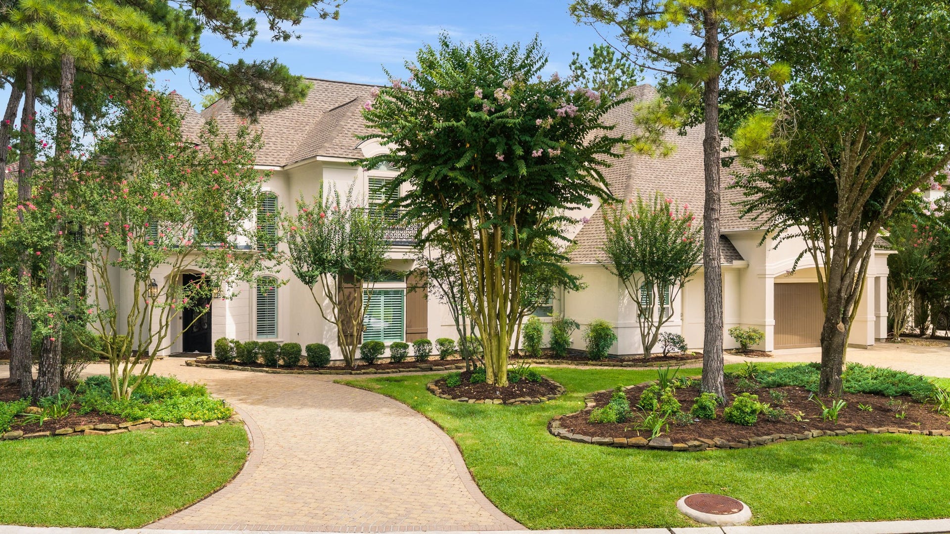 39 N Palmiera Circle, The Woodlands, TX 77382 Property features a generous circle drive and second double wide driveway. (2026 EXTERIOR FULLY PAINTED - 2026 ROOF - ALL NEW AC'S 2026!).