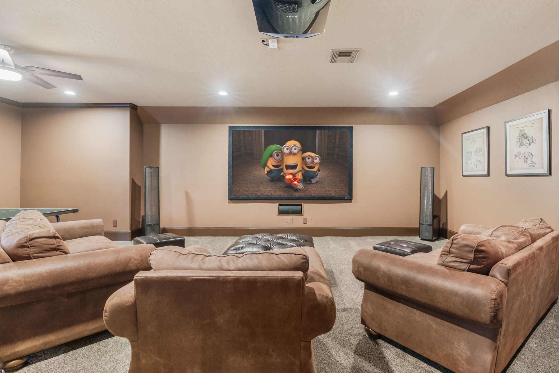 39 N Palmiera Circle, The Woodlands, TX 77382 Dedicated media room with theater-style seating and big-screen setup. Additional space for full size gaming table and more!