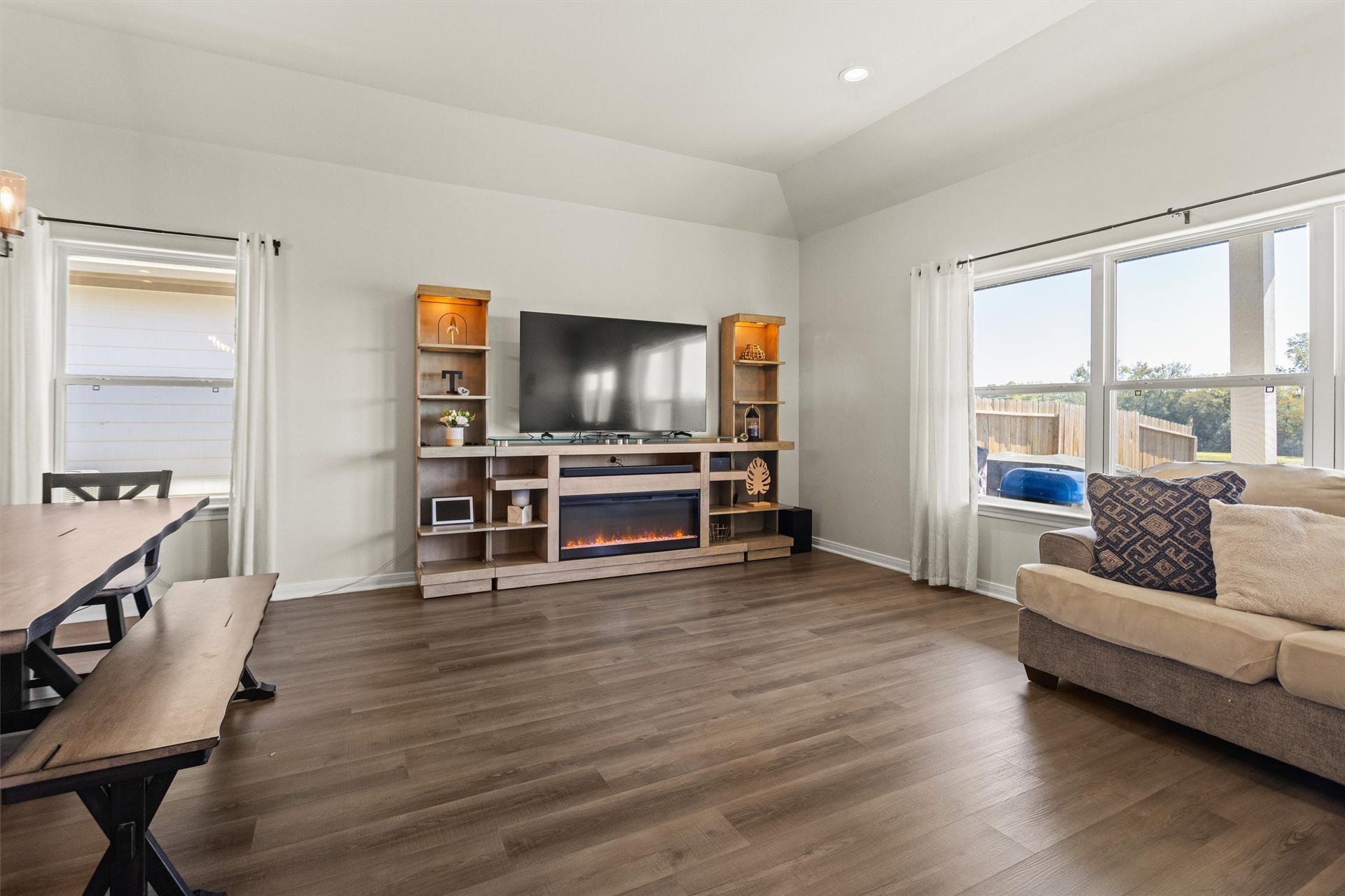 11731 Eclipse Drive, Willis, TX 77318 The wall of windows make this room bright and airy.