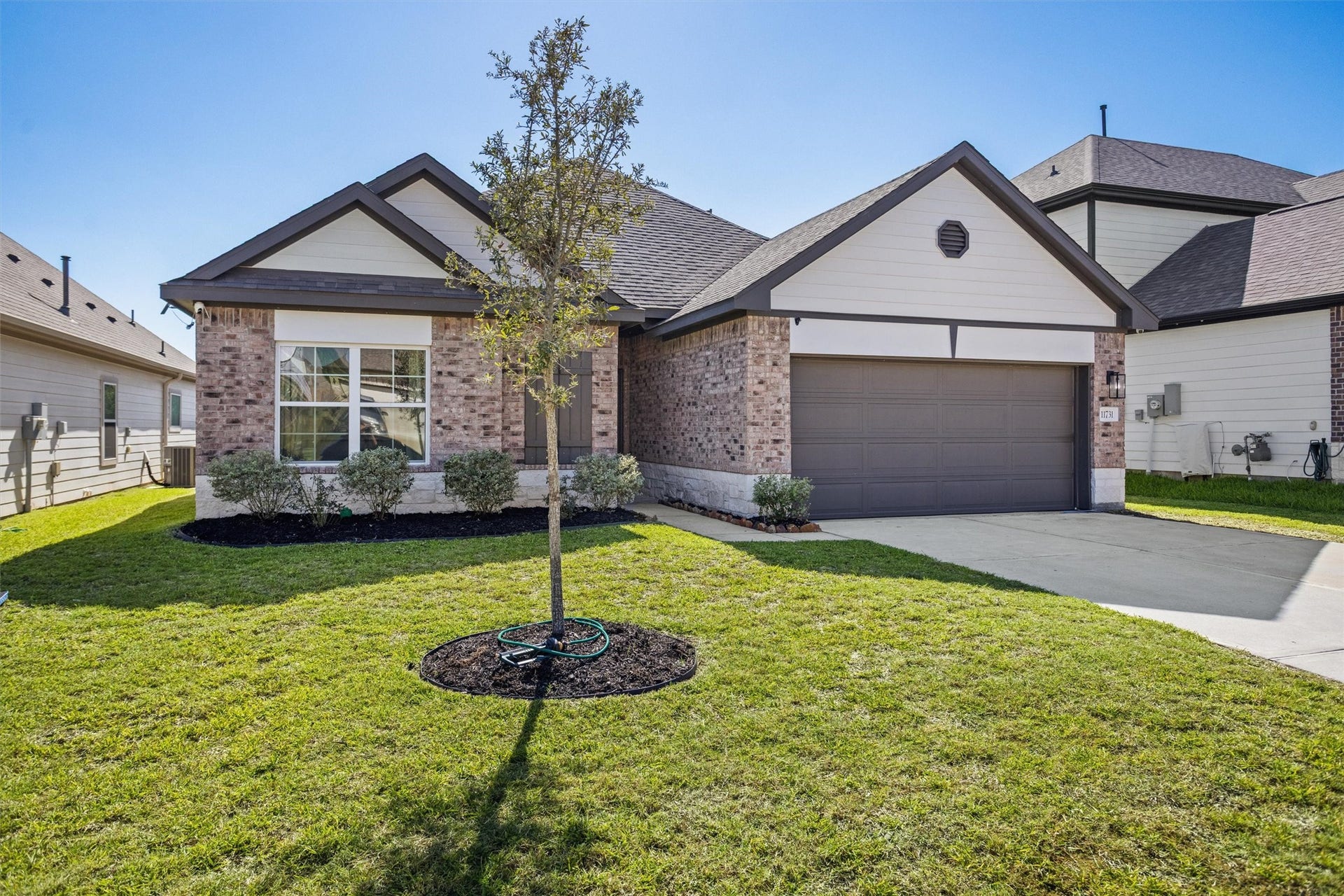 11731 Eclipse Drive, Willis, TX 77318 The Texas landscaping is beautiful and makes for a minimal effort yard.
