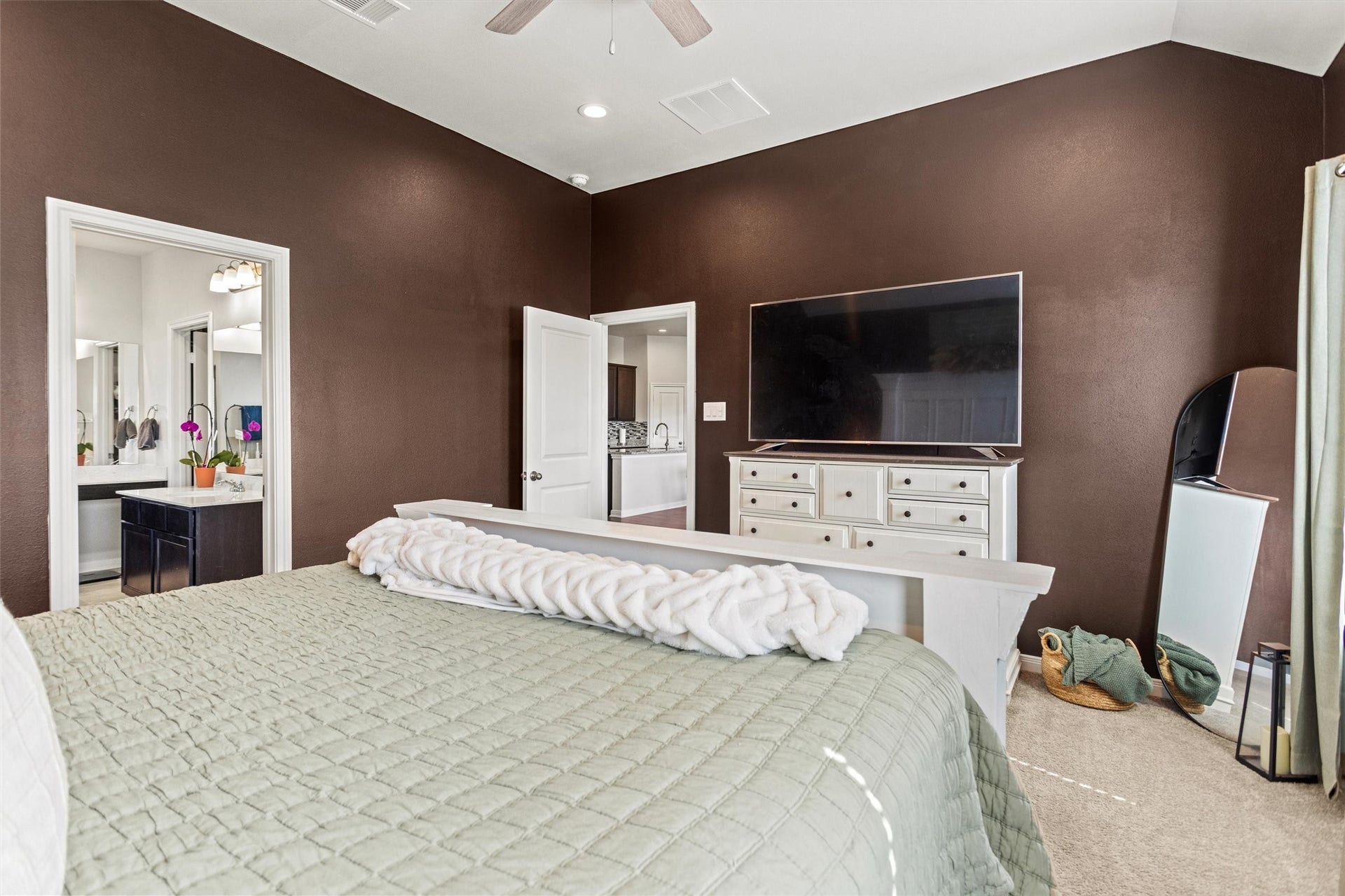 11731 Eclipse Drive, Willis, TX 77318 Primary suite leading into the en-suite bathroom.
