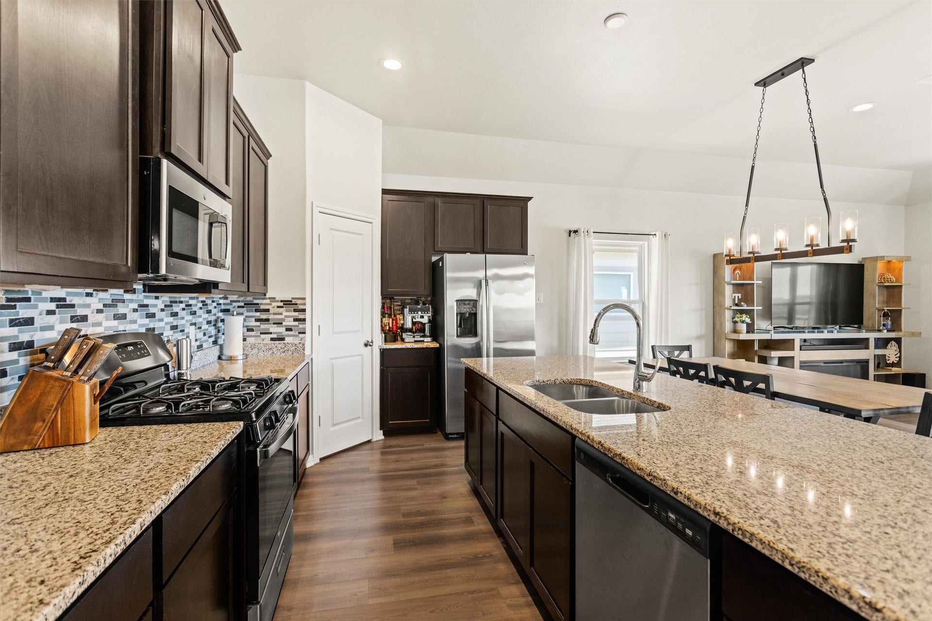 11731 Eclipse Drive, Willis, TX 77318 Granite countertops in the kitchen.