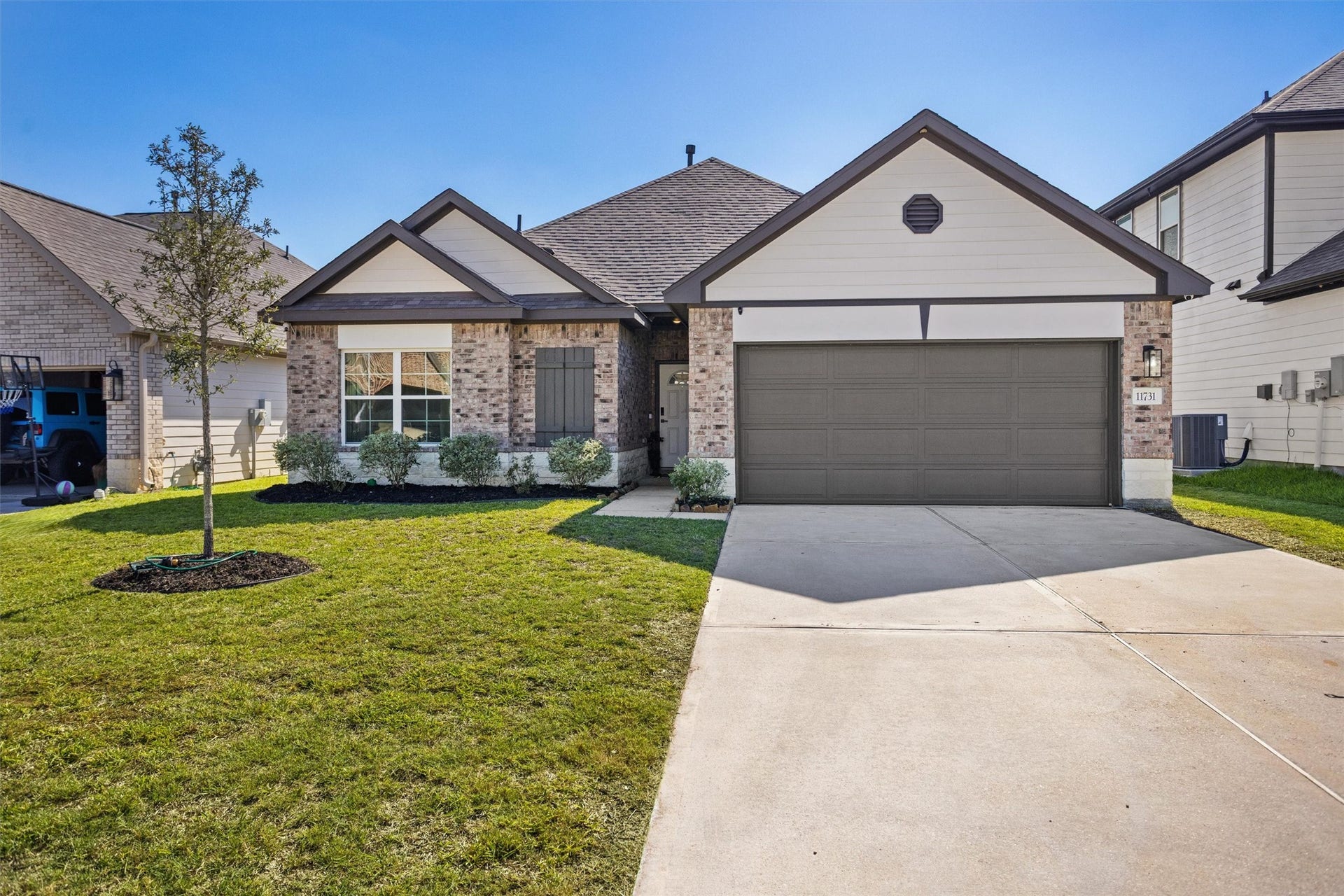 11731 Eclipse Drive, Willis, TX 77318 Elevation and brick on this home make it stand out.
