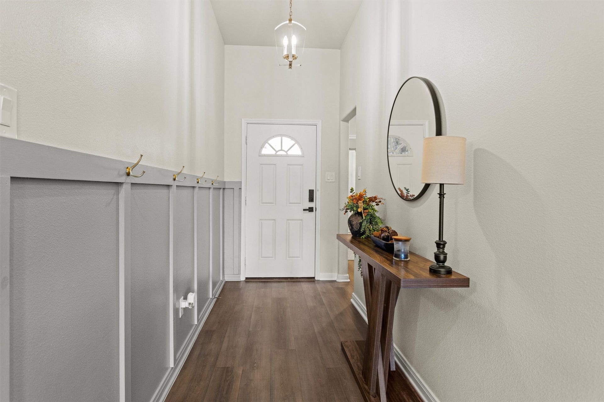 11731 Eclipse Drive, Willis, TX 77318 The custom entry way give this home a ton of character.