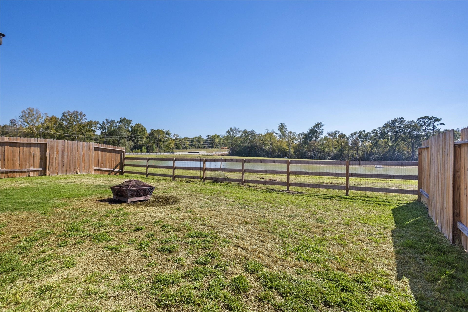 11731 Eclipse Drive, Willis, TX 77318 Imagine sitting on the back patio with this water view.