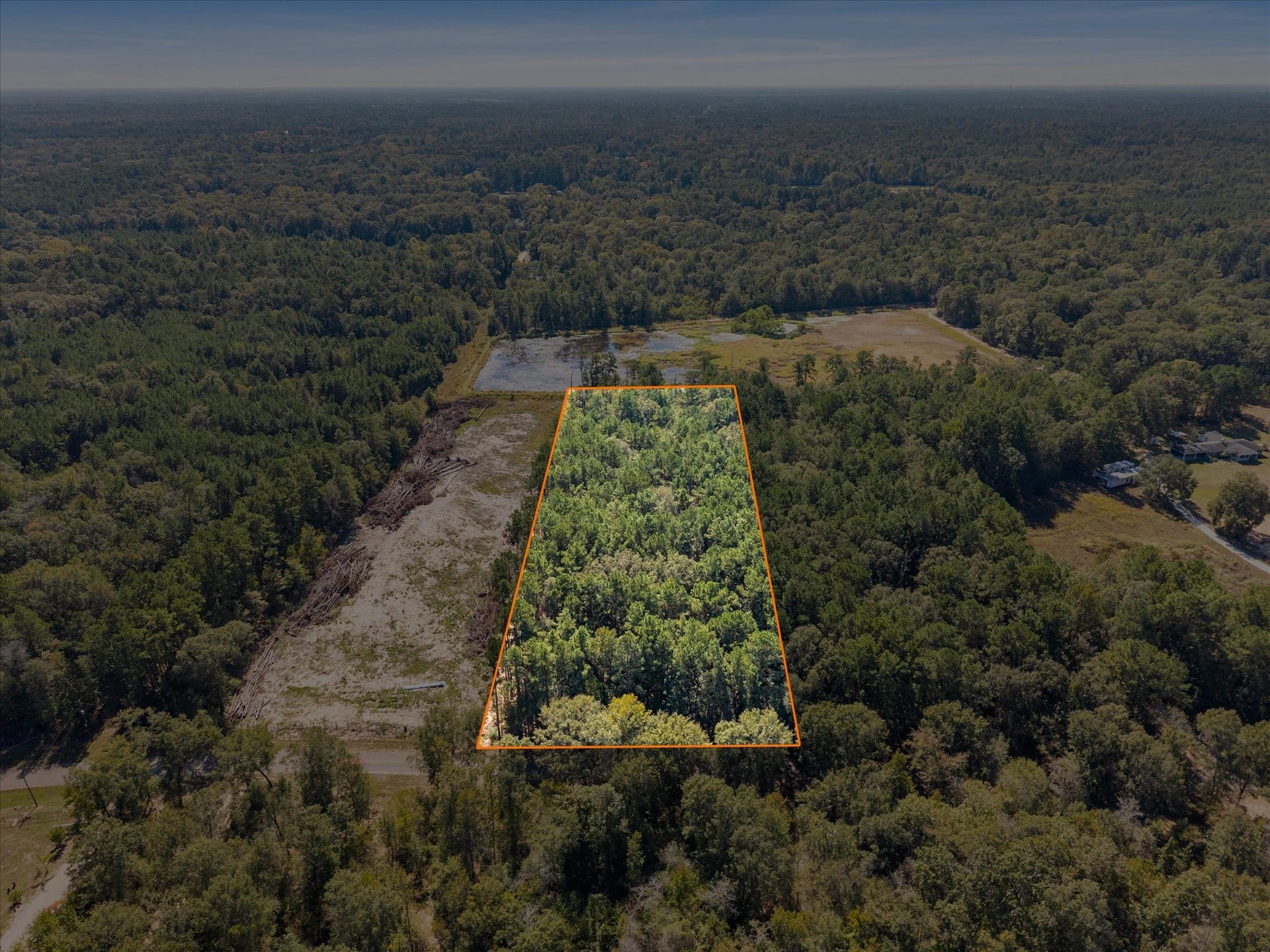 3.5 acres in the Conroe area, with clearing planned.