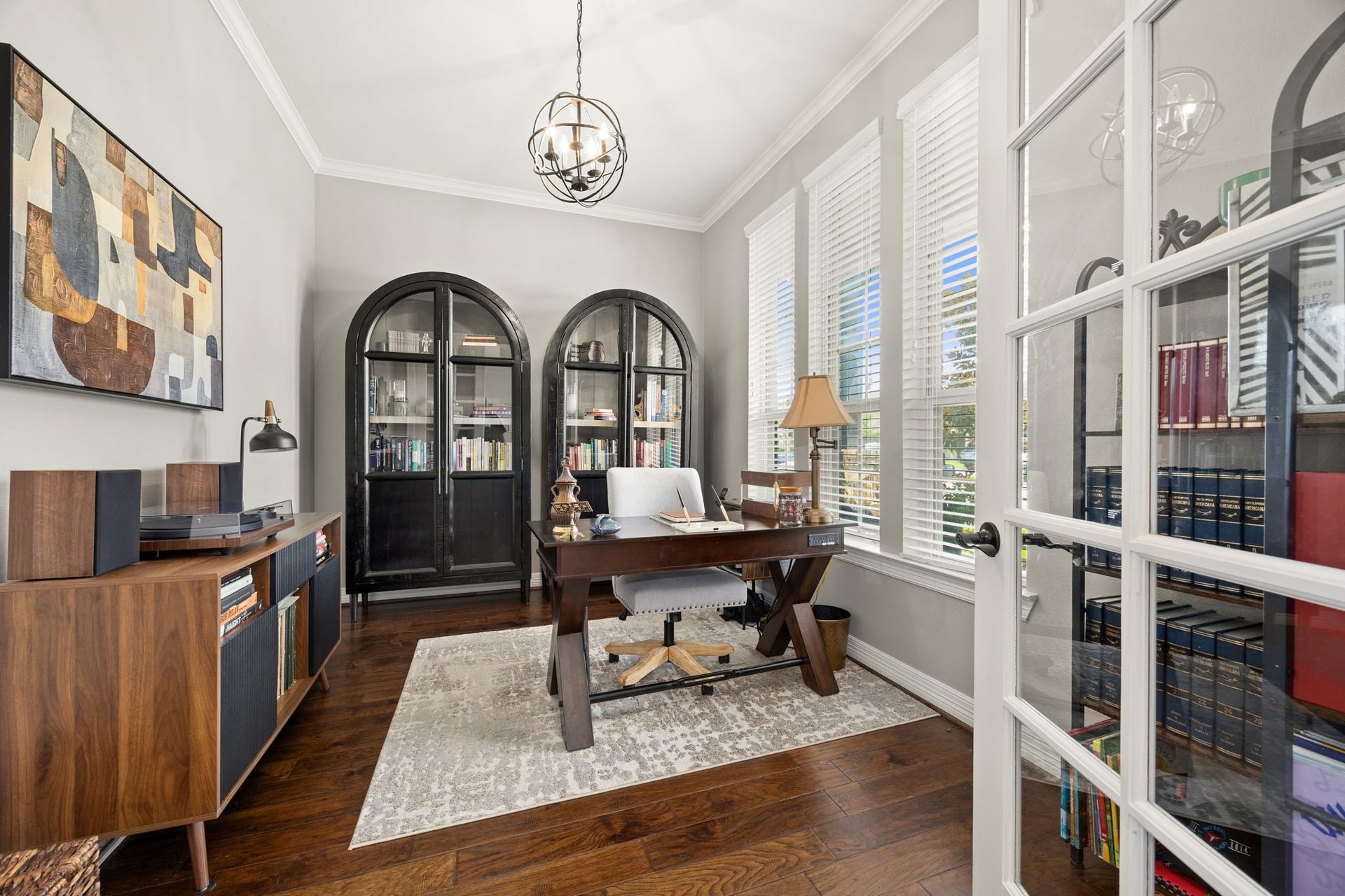 13522 Columbia Key Drive, Tomball, TX 77377 Just off the entry, the private study is framed by French doors and filled with natural light from three large windows - an ideal space for working from home, reading, or quiet focus.