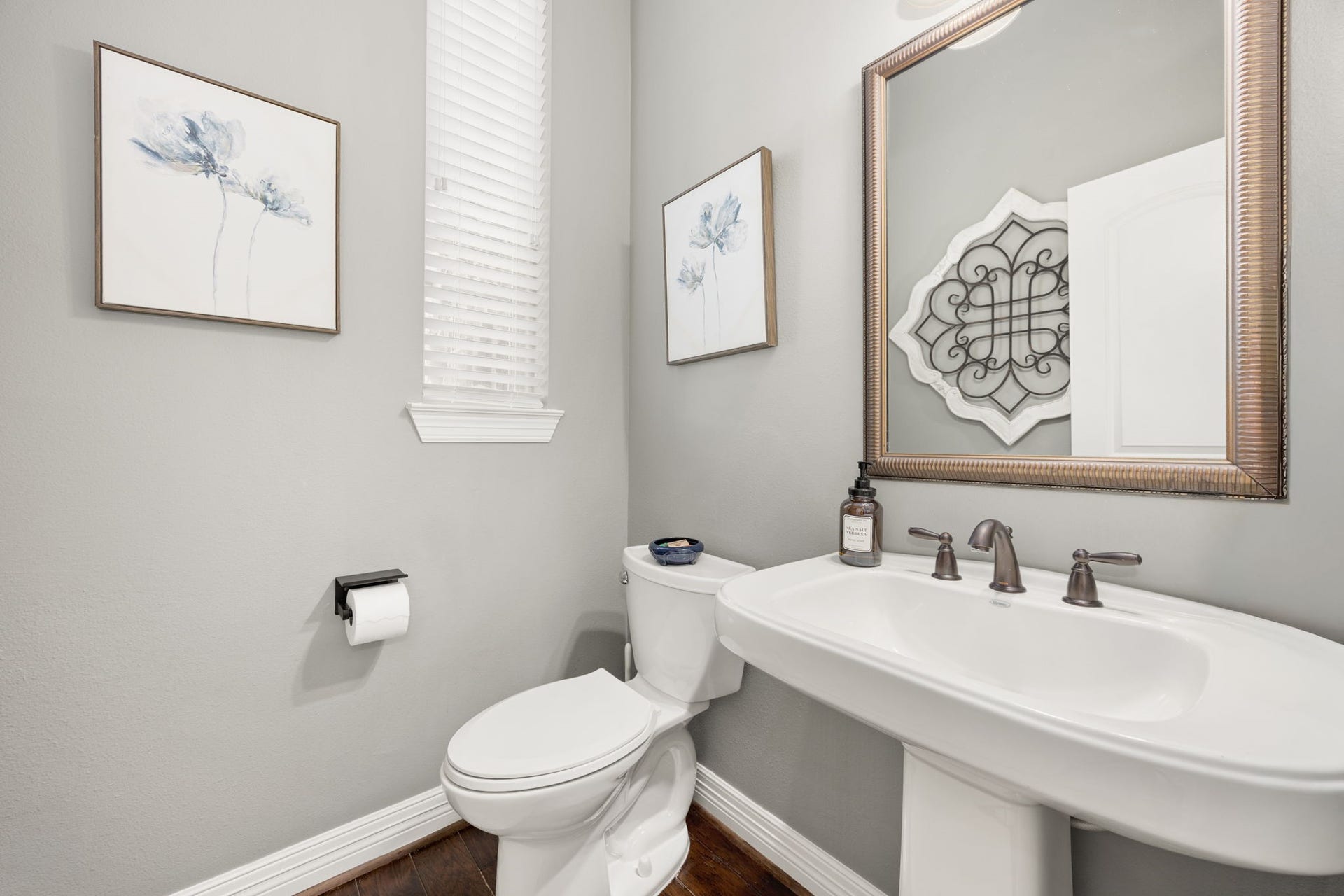 13522 Columbia Key Drive, Tomball, TX 77377 A conveniently located powder bath adds everyday function for guests while keeping the main living areas comfortable and accessible.