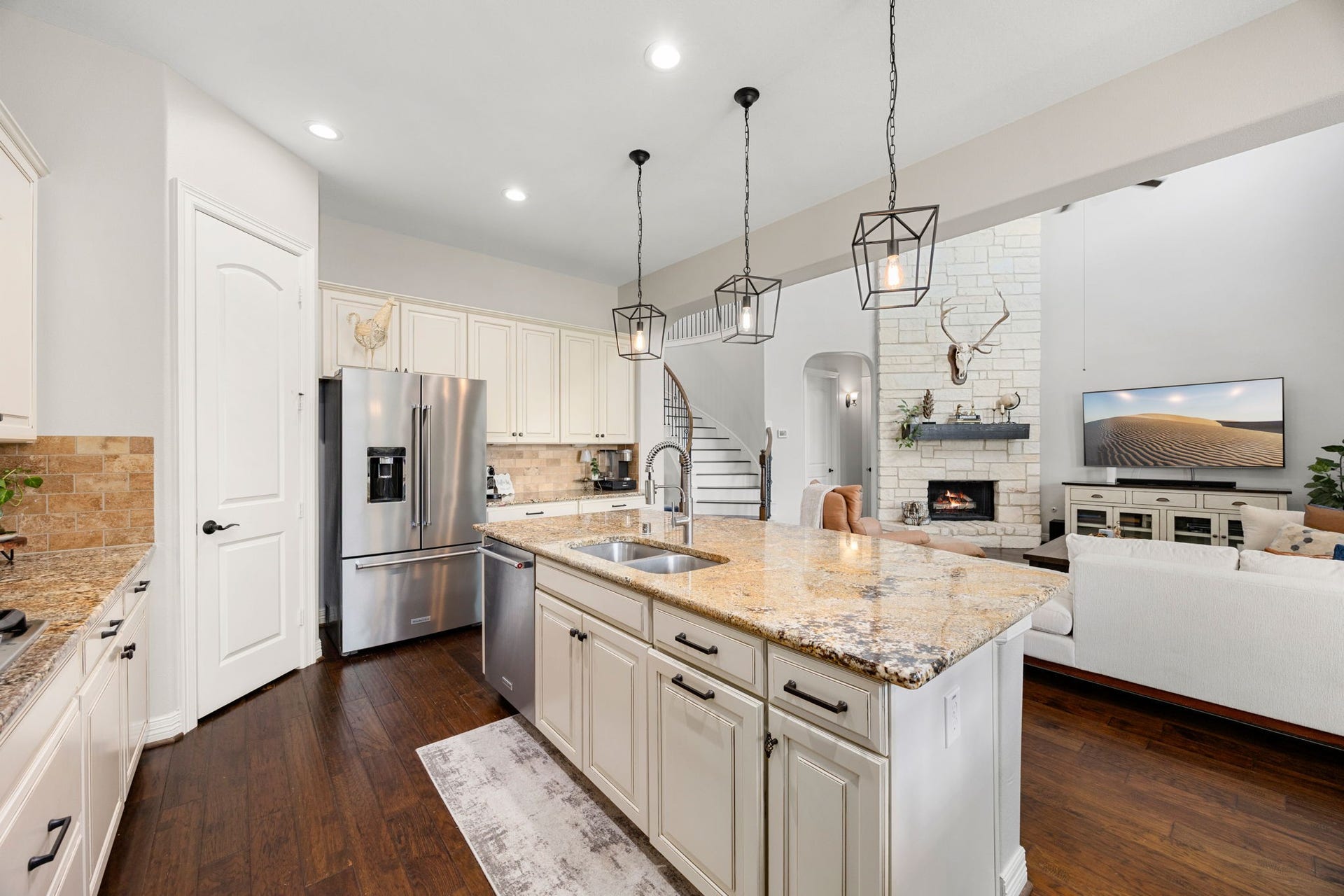 13522 Columbia Key Drive, Tomball, TX 77377 Looking toward the front of the home, this angle highlights the island, pantry access, and extra counter space perfect for a coffee bar or everyday drop zone.