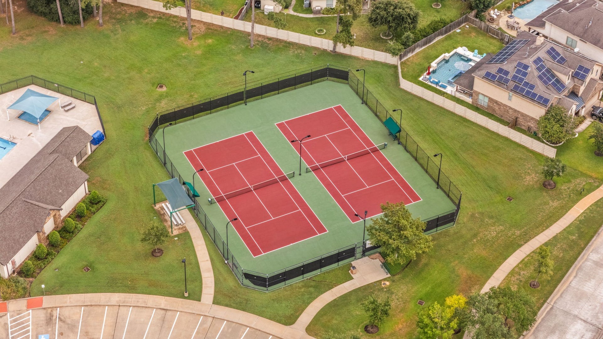 13522 Columbia Key Drive, Tomball, TX 77377 Enjoy access to neighborhood tennis courts, adding another layer of recreation within the Wildwood at Northpointe community.