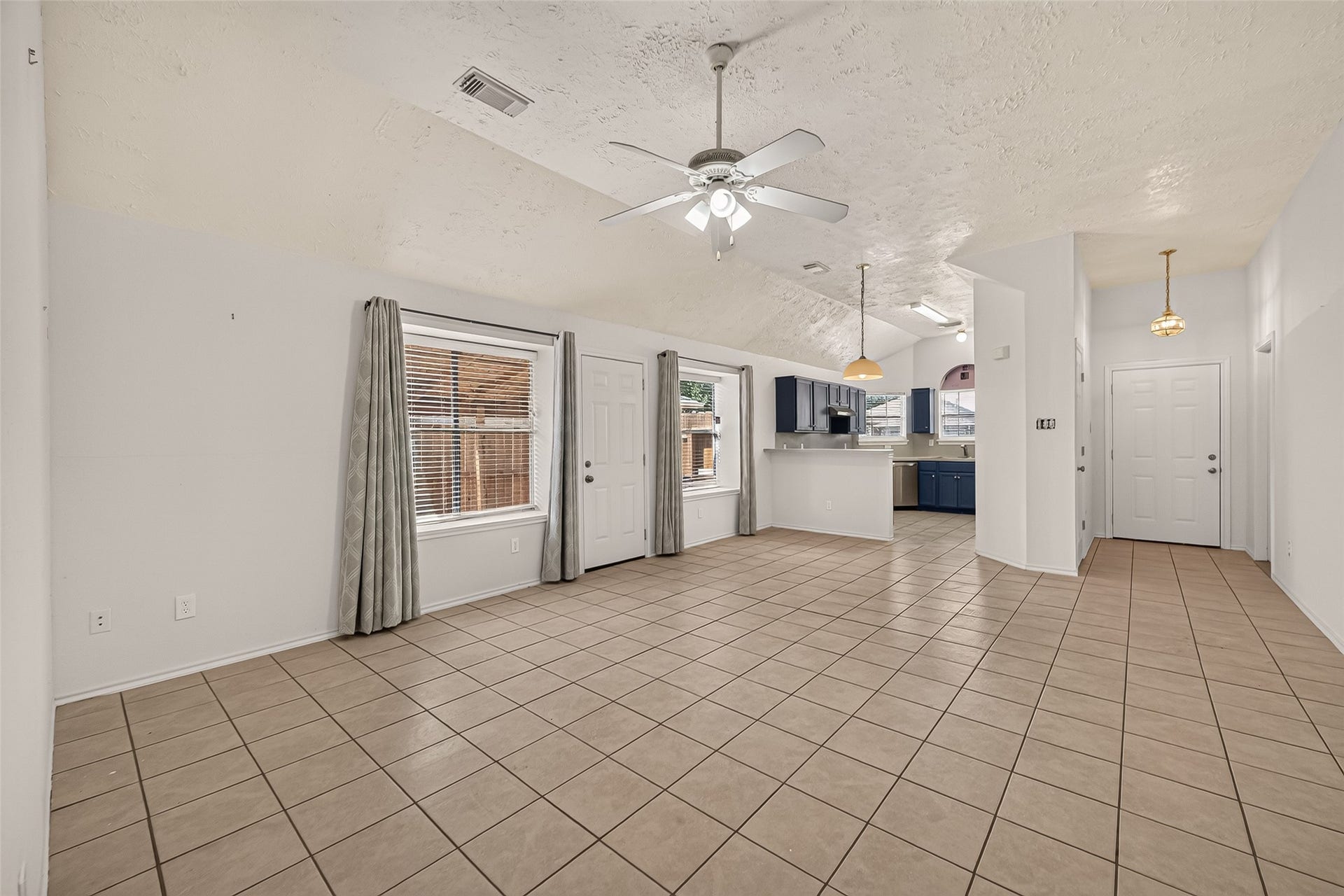 3356 Rachel Lane, Katy, TX 77493 Walking out of the hallway, the open concept living and kitchen allows for easy movement from one to the other.