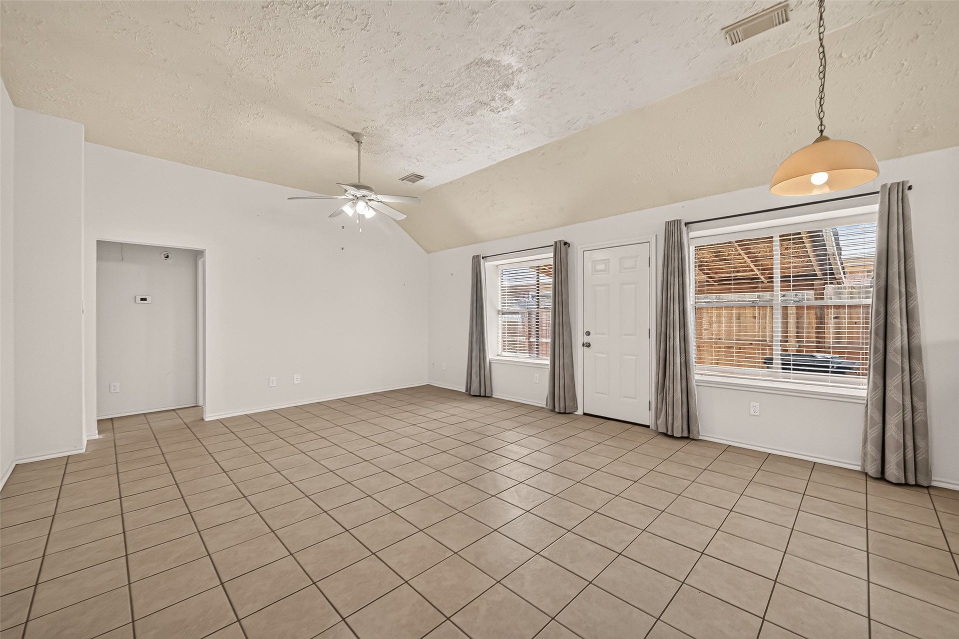 3356 Rachel Lane, Katy, TX 77493 The living area is open and has natural light from the south side of the home. Multiple locations for entertainment centers, couches, and chairs.