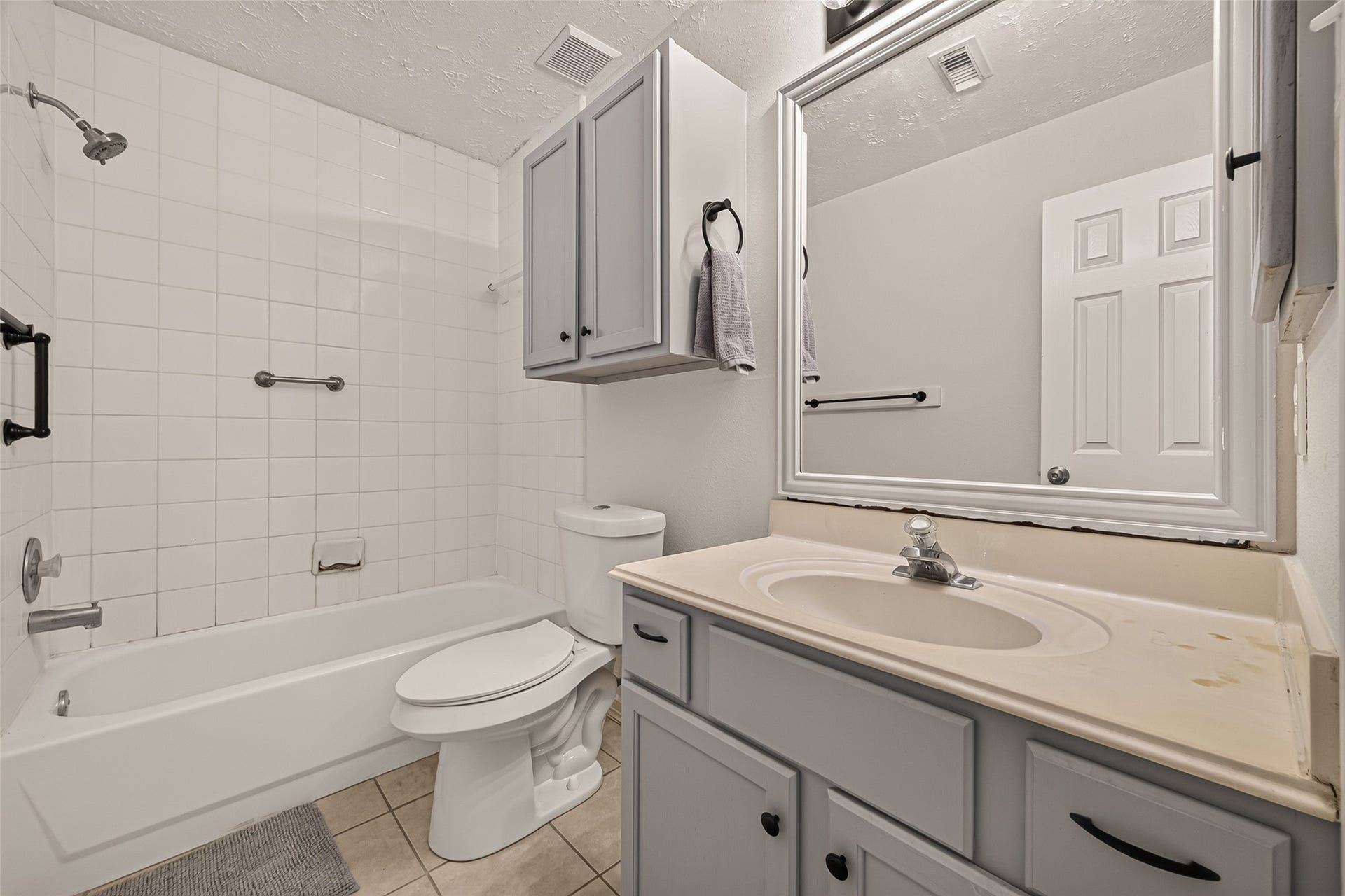 3356 Rachel Lane, Katy, TX 77493 This guest bathroom is located inside this hallway and is a great combination of bath and shower.