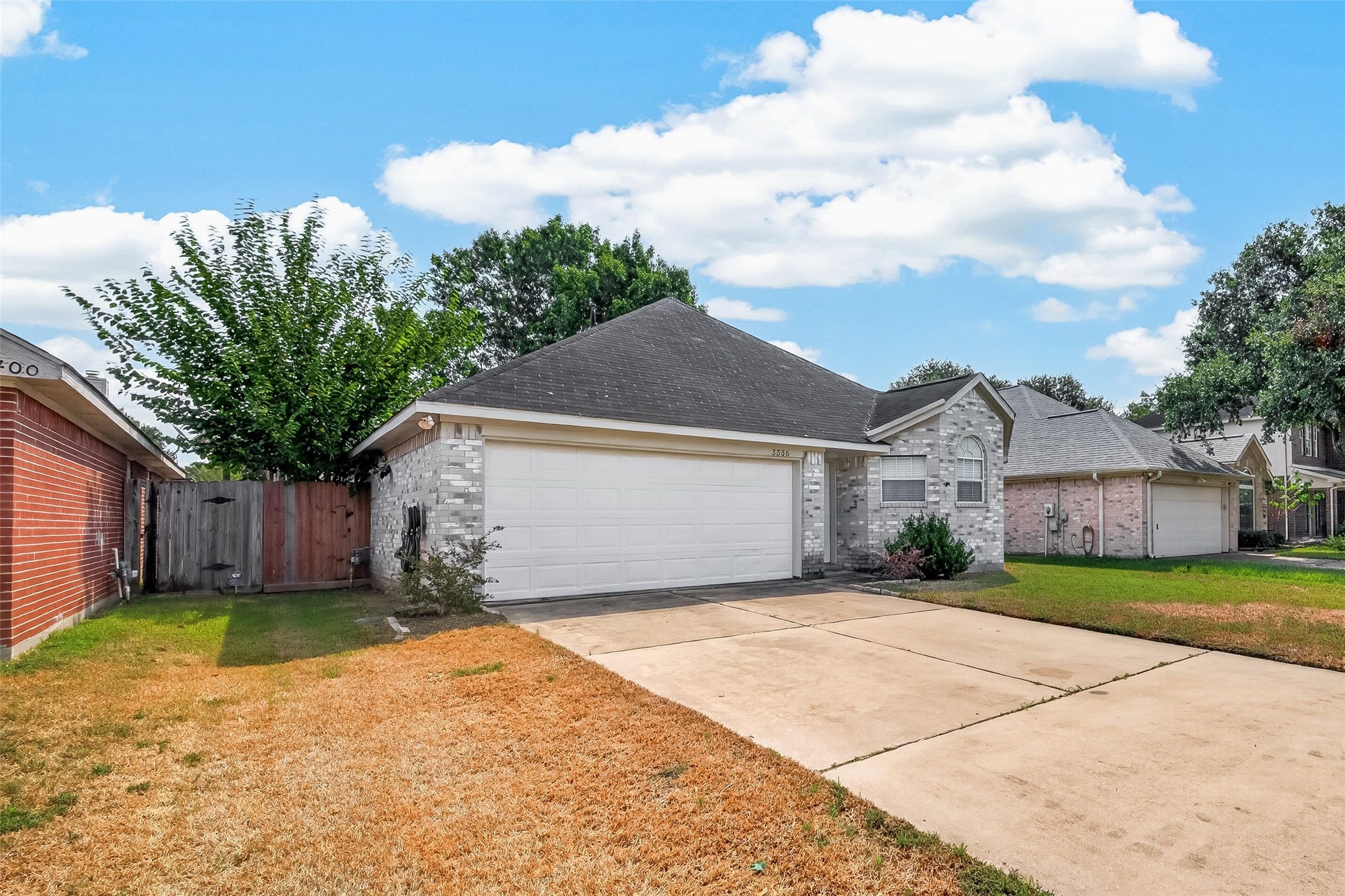3356 Rachel Lane, Katy, TX 77493 Two car garage and a driveway capable of several cars or trucks.
