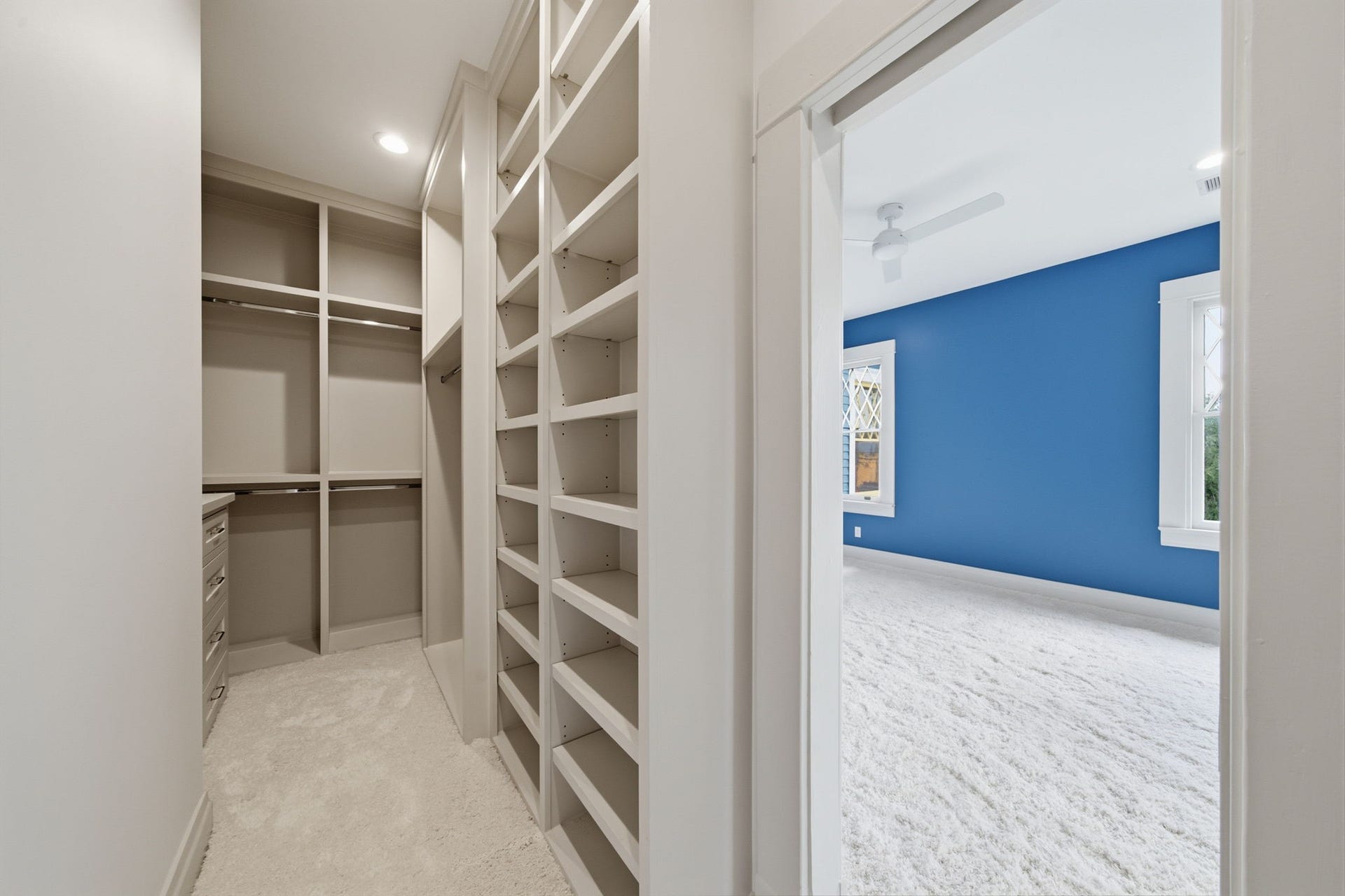 404 Avondale Street, Houston, TX 77006 Large walk-in closet with ample shelving and dual closed cabinetry for storage.