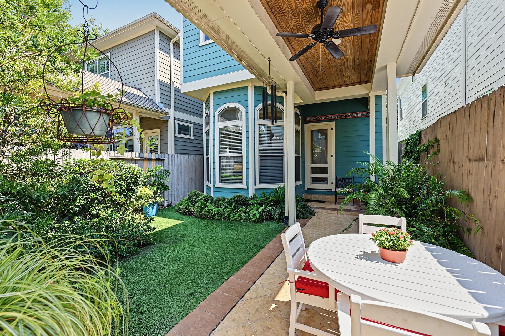 Great backyard space with covered walkway, patio area and easy to maintain turf.