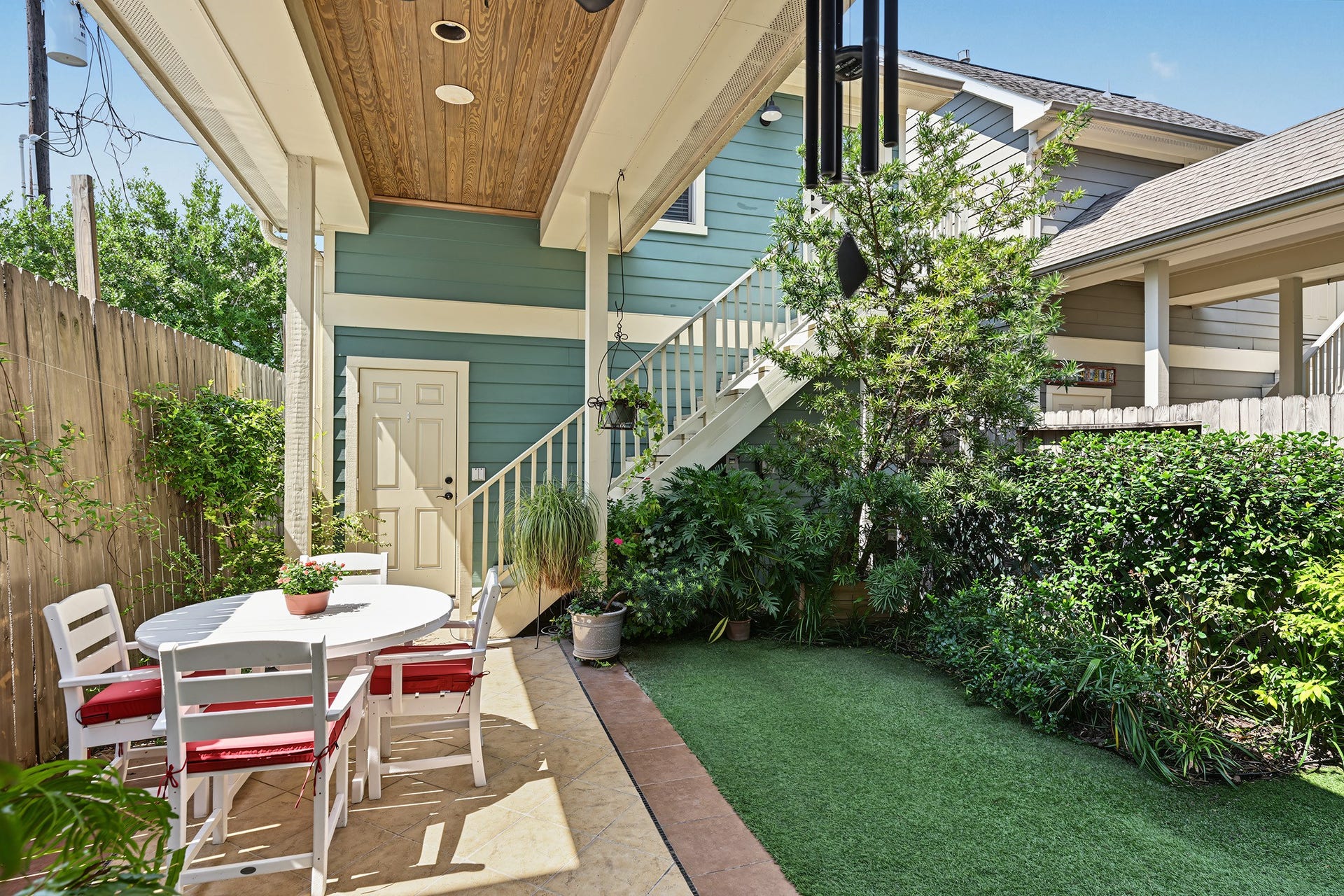 Peaceful and private setting. Stairs up to the garage apartment.